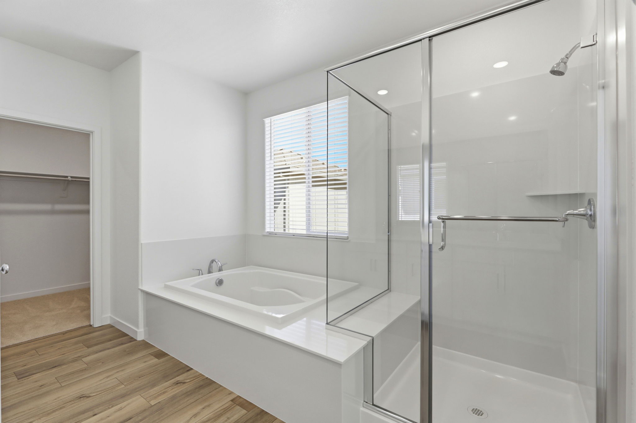 A bathroom with a glass shower.