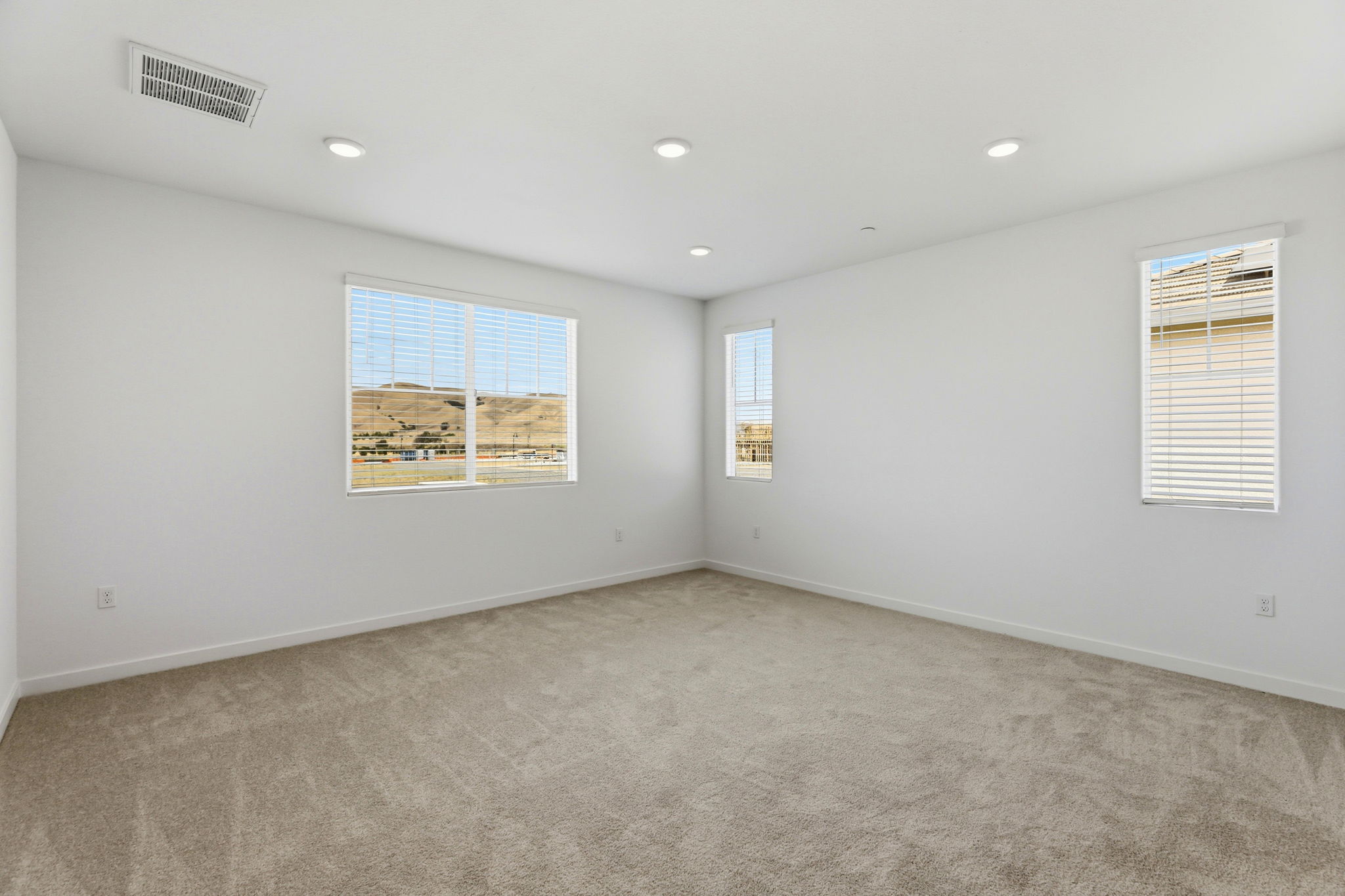 A room with a few windows.