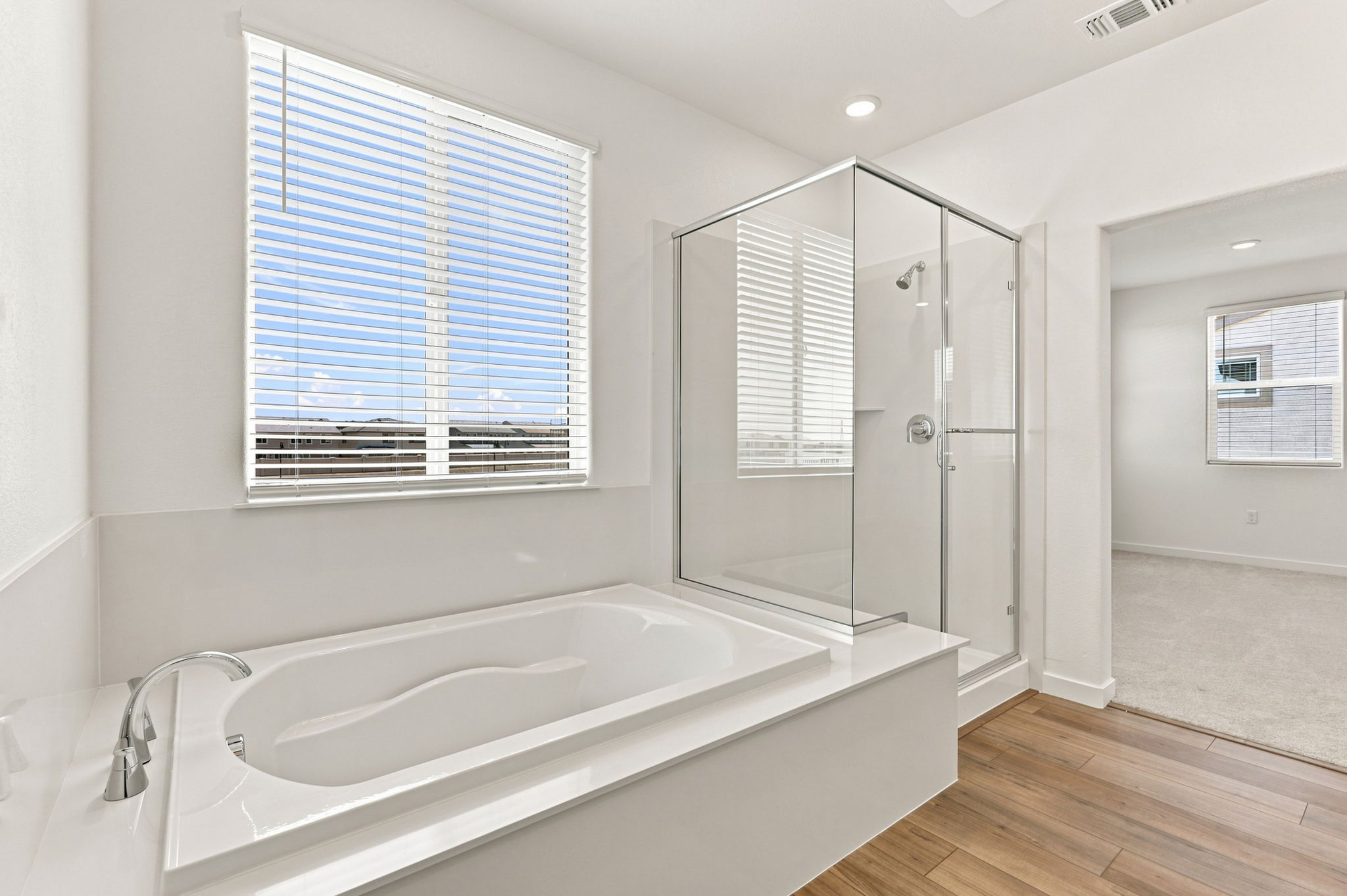 A bathroom with a glass shower.