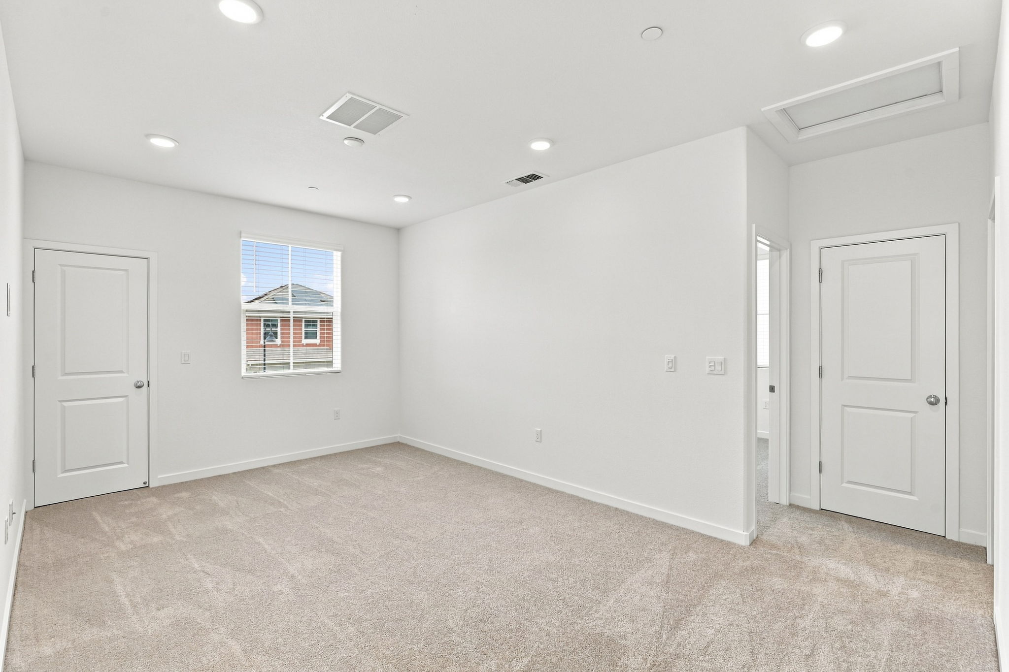 A room with white doors.