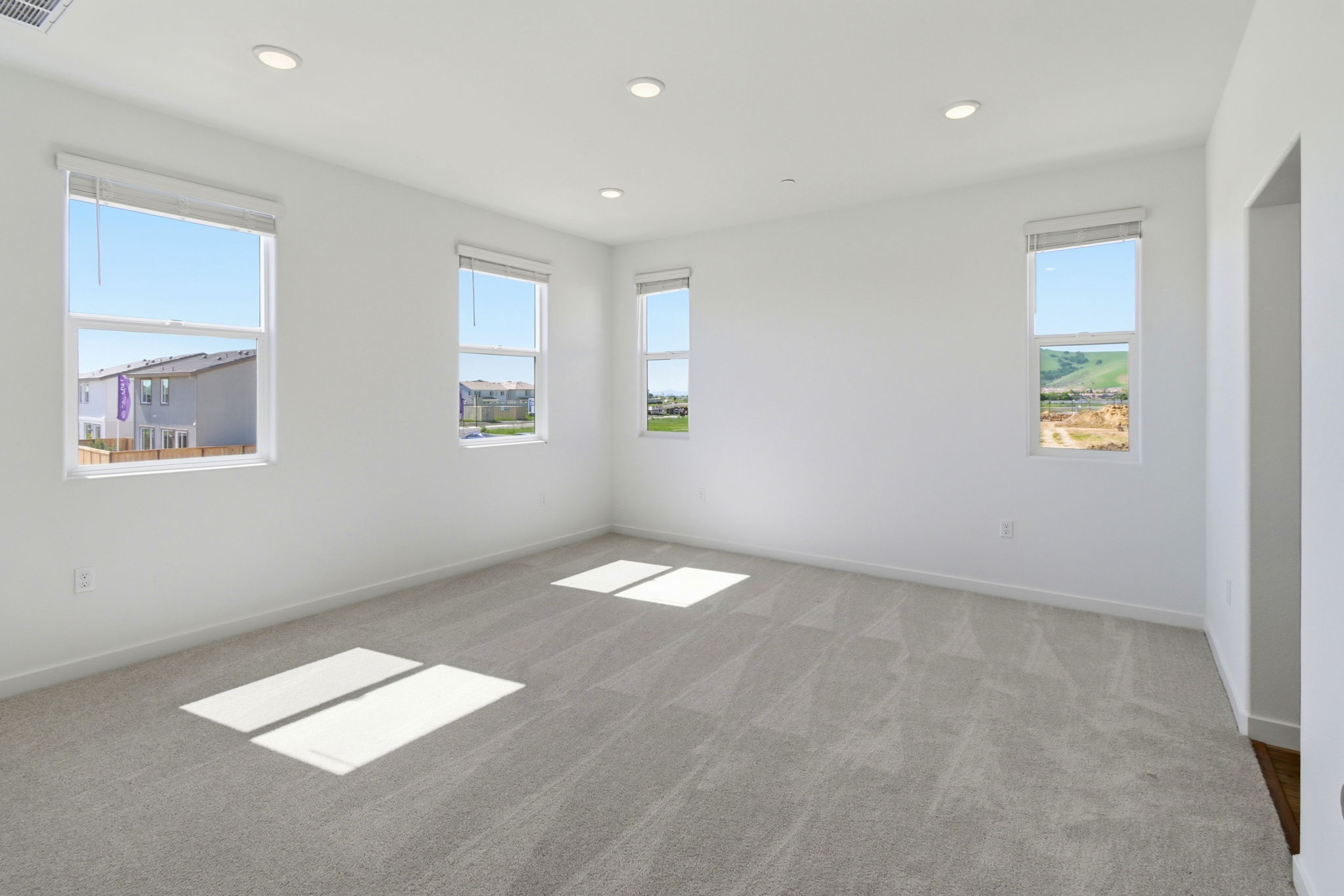 A room with a few windows.