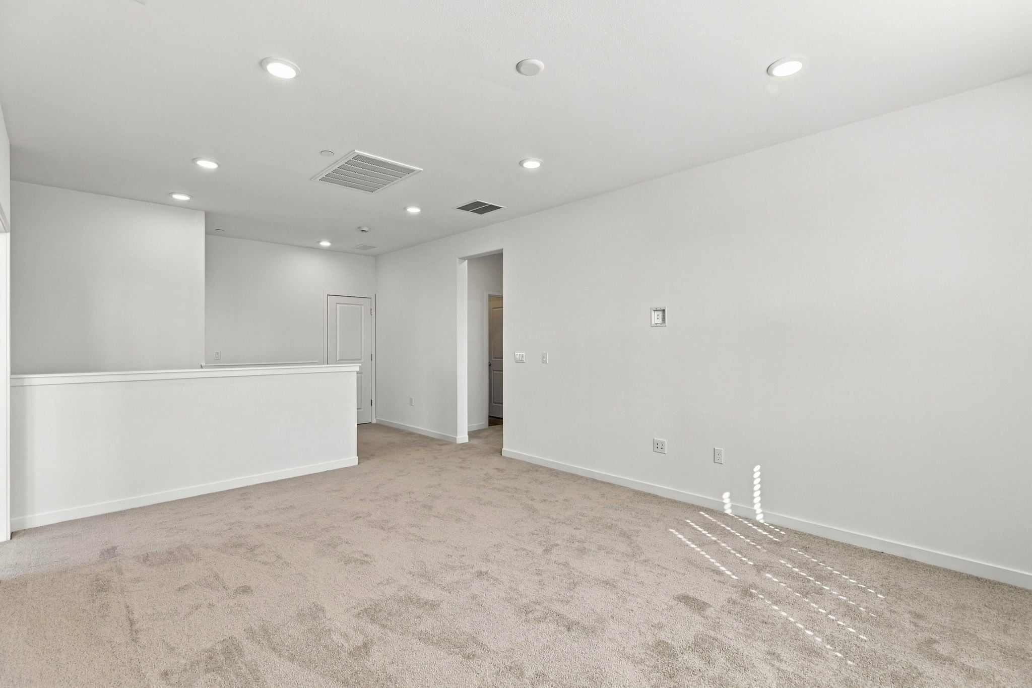 A room with white walls.