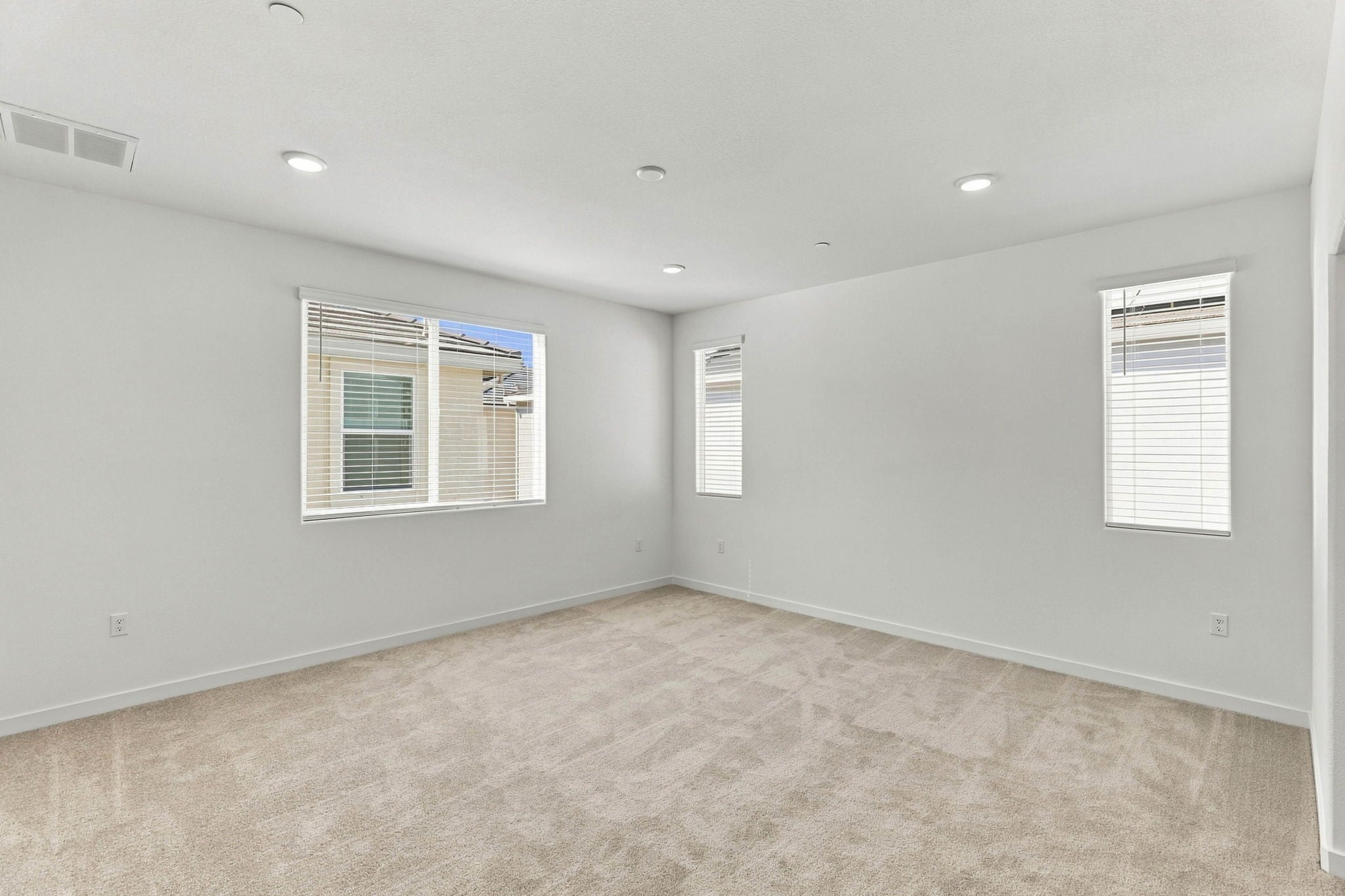 A room with a few windows.