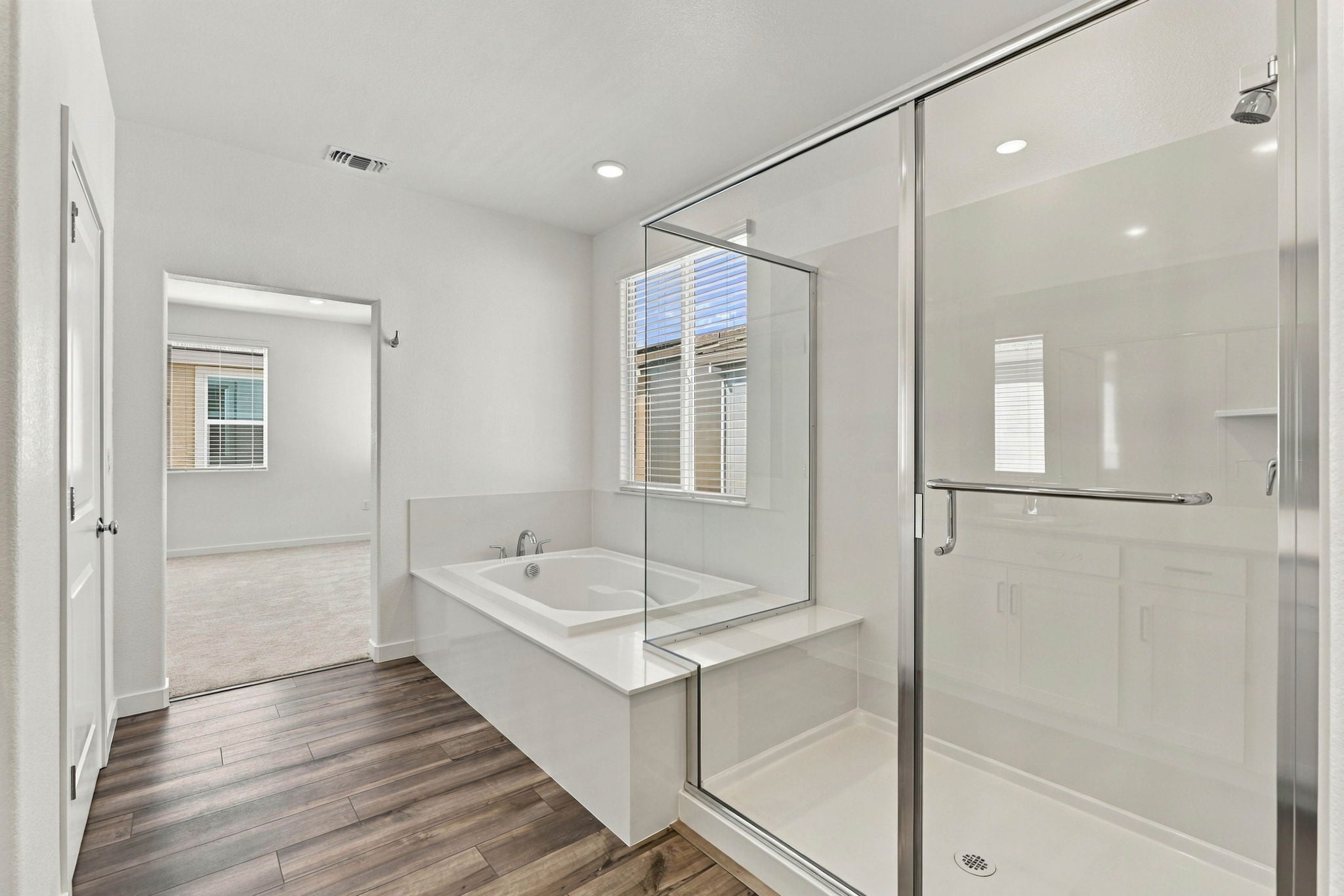 A bathroom with a glass shower.