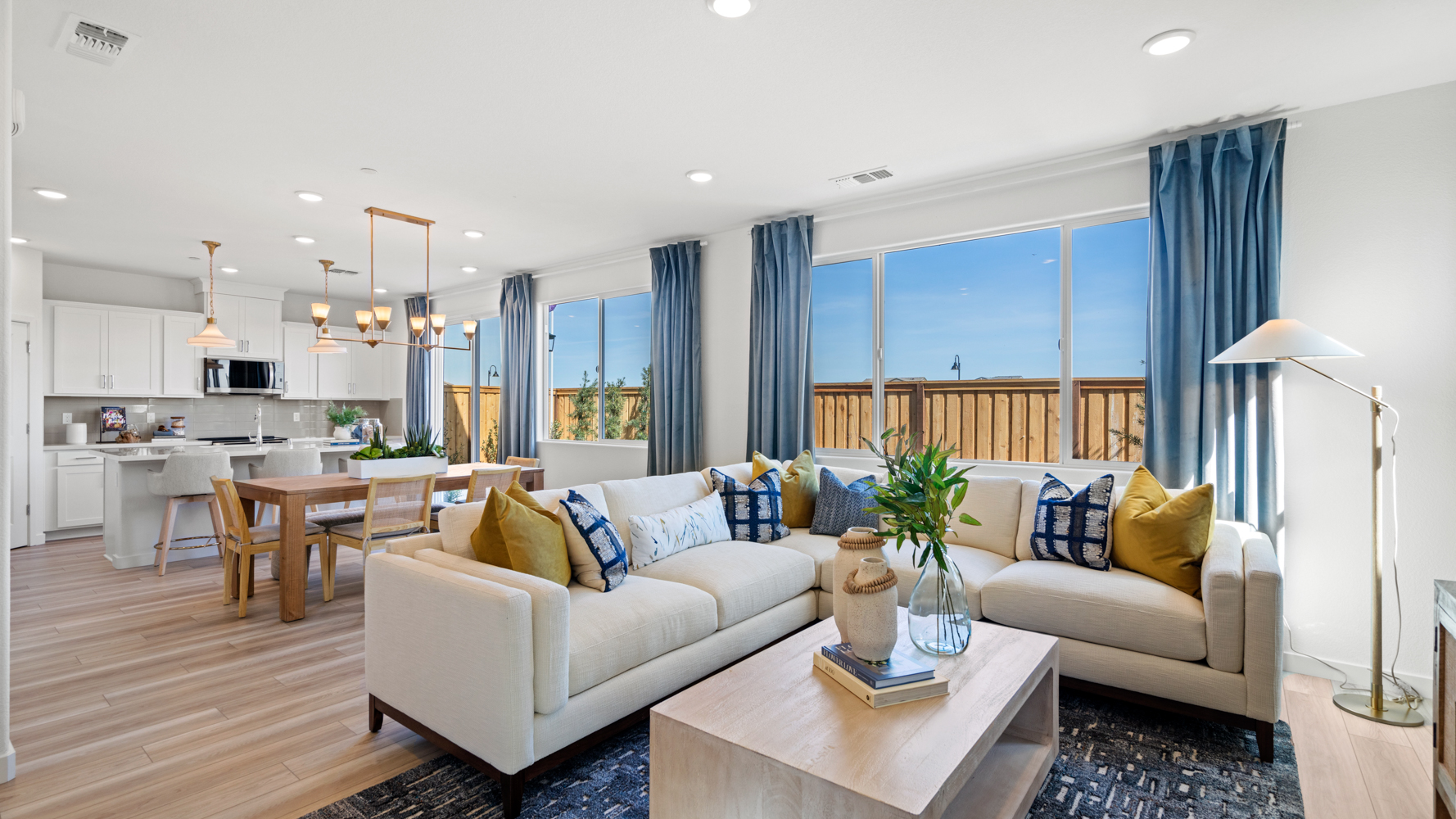 A living room with a large window.