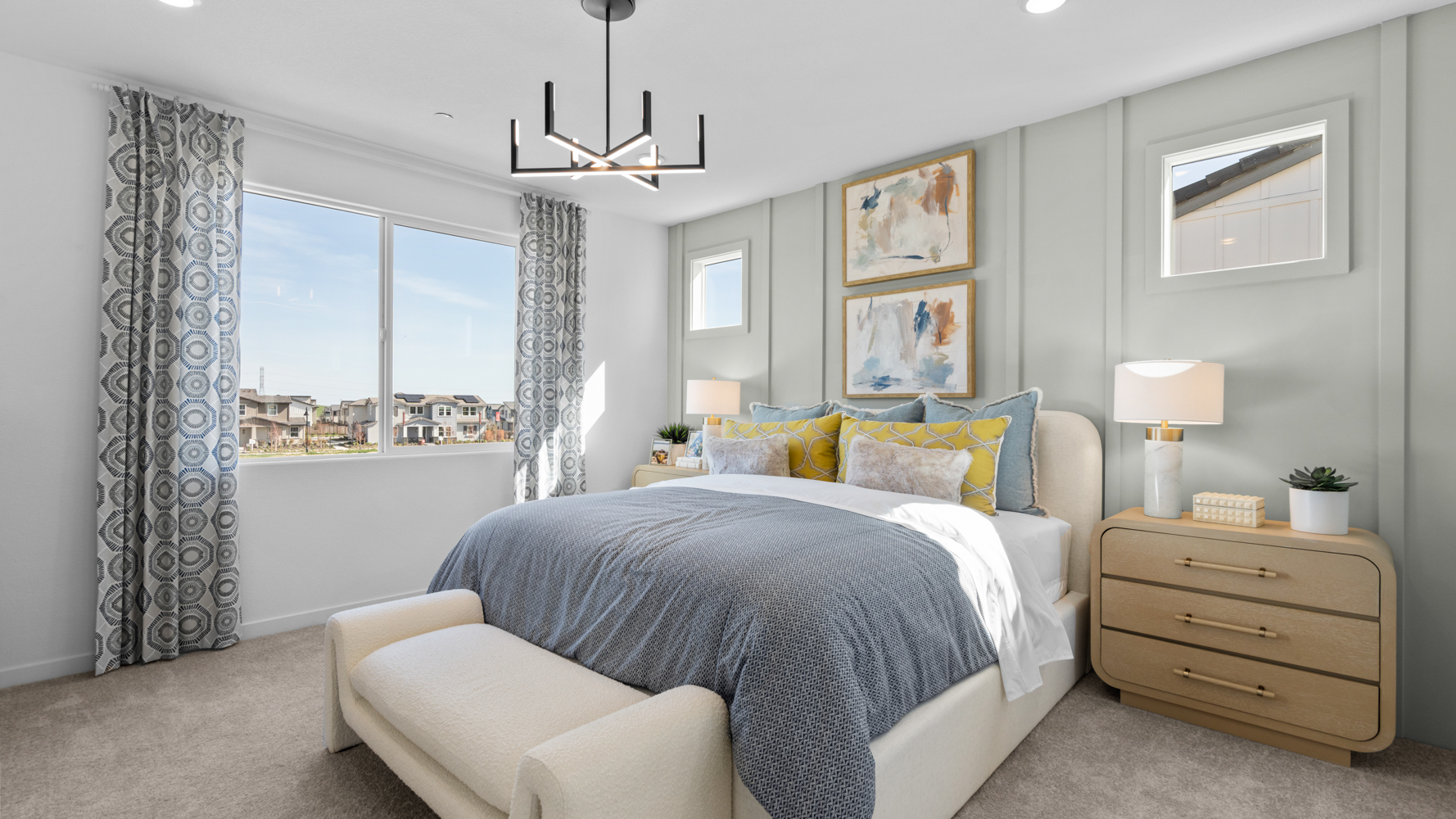 A bedroom with a bed and a window.