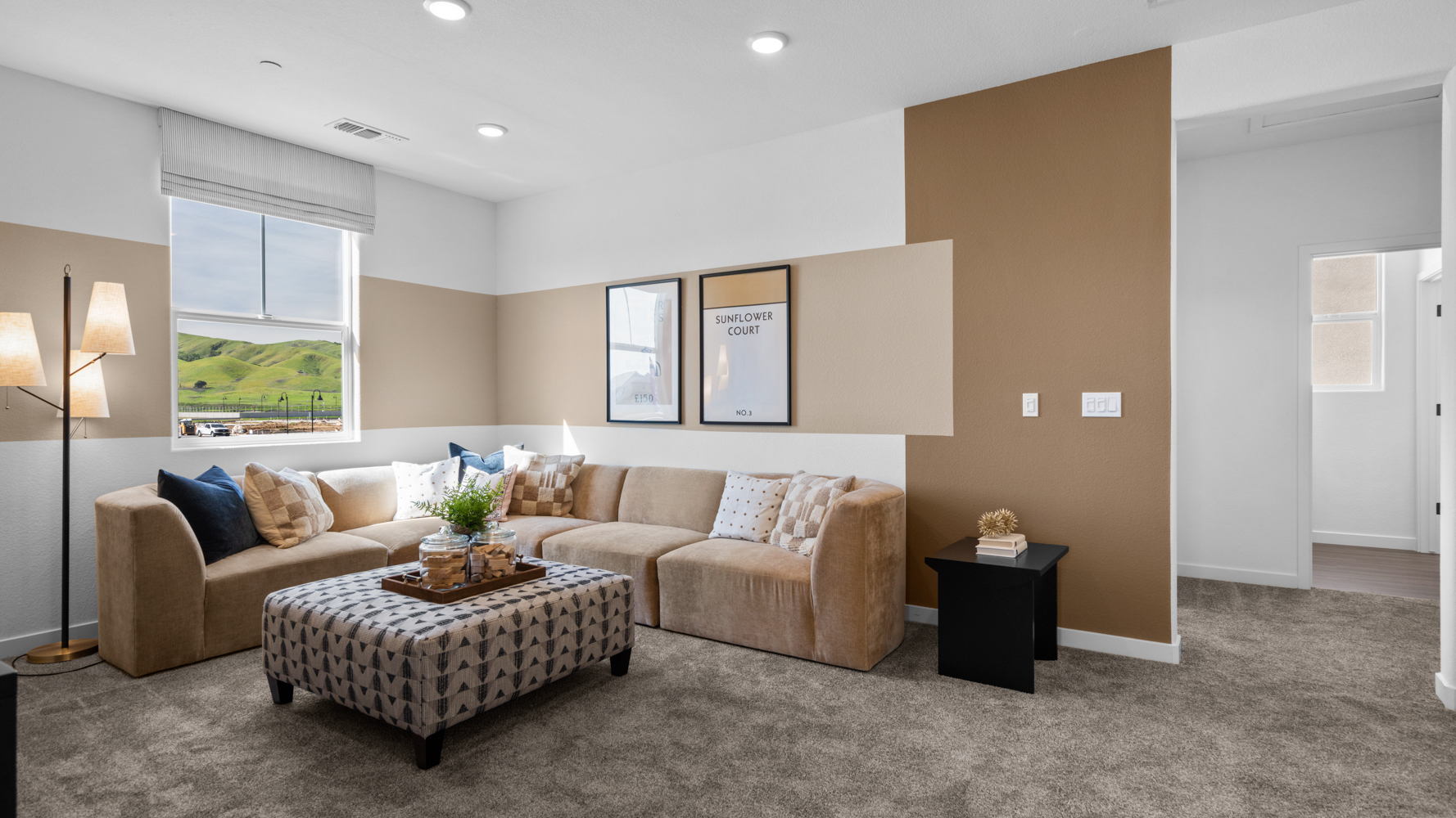 A living room with a couch and a coffee table.