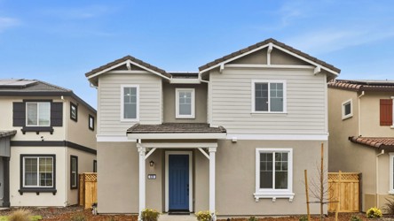 A house with a blue door.