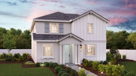 A house with a large front yard.