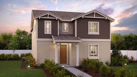 A house with a yard and a fence.