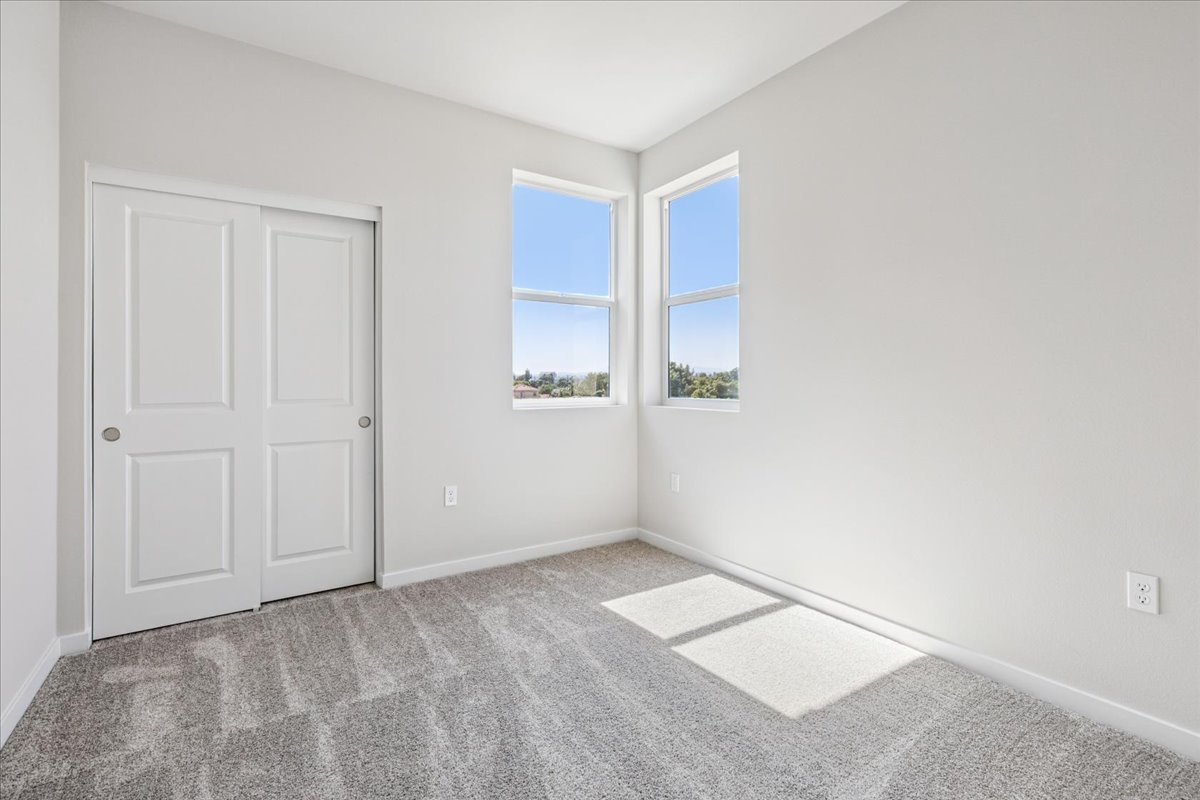 A room with white doors and windows.