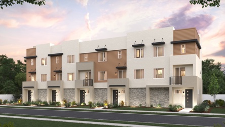 A large building with a driveway.