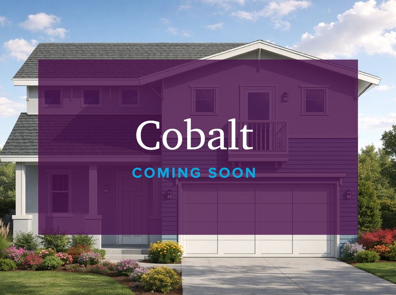 A pink house with a driveway.