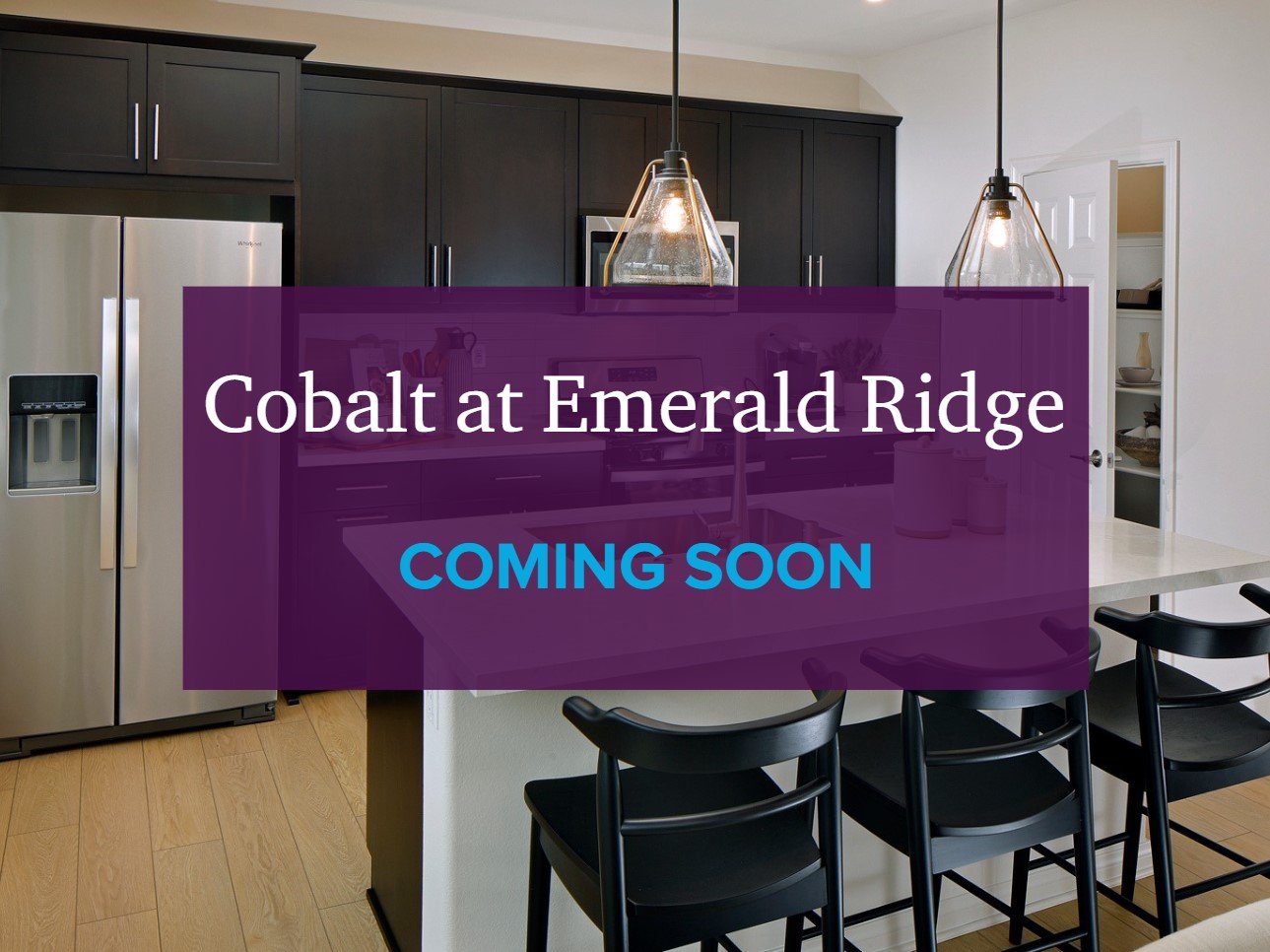 A room with a table and chairs.