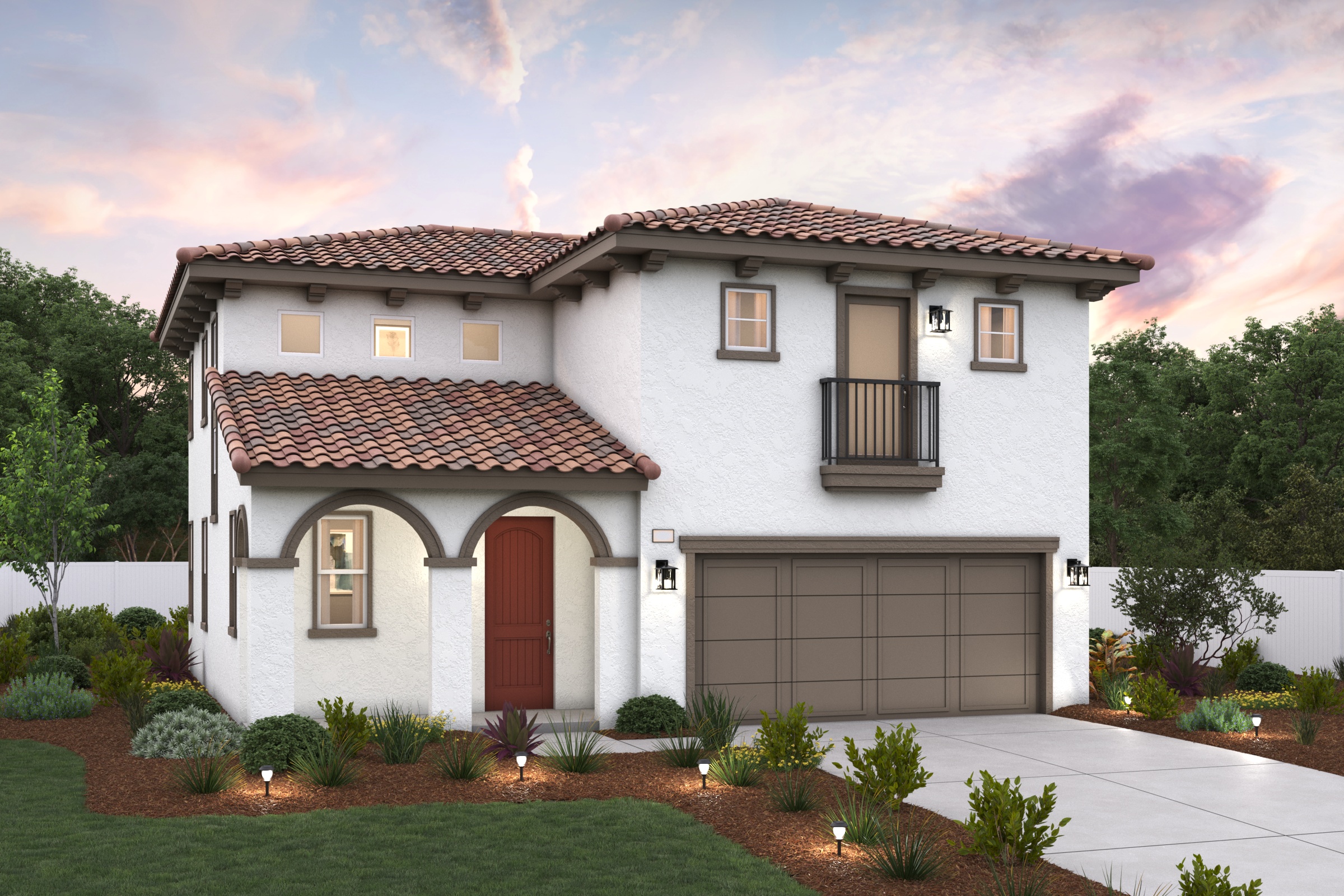 A white house with a garage.