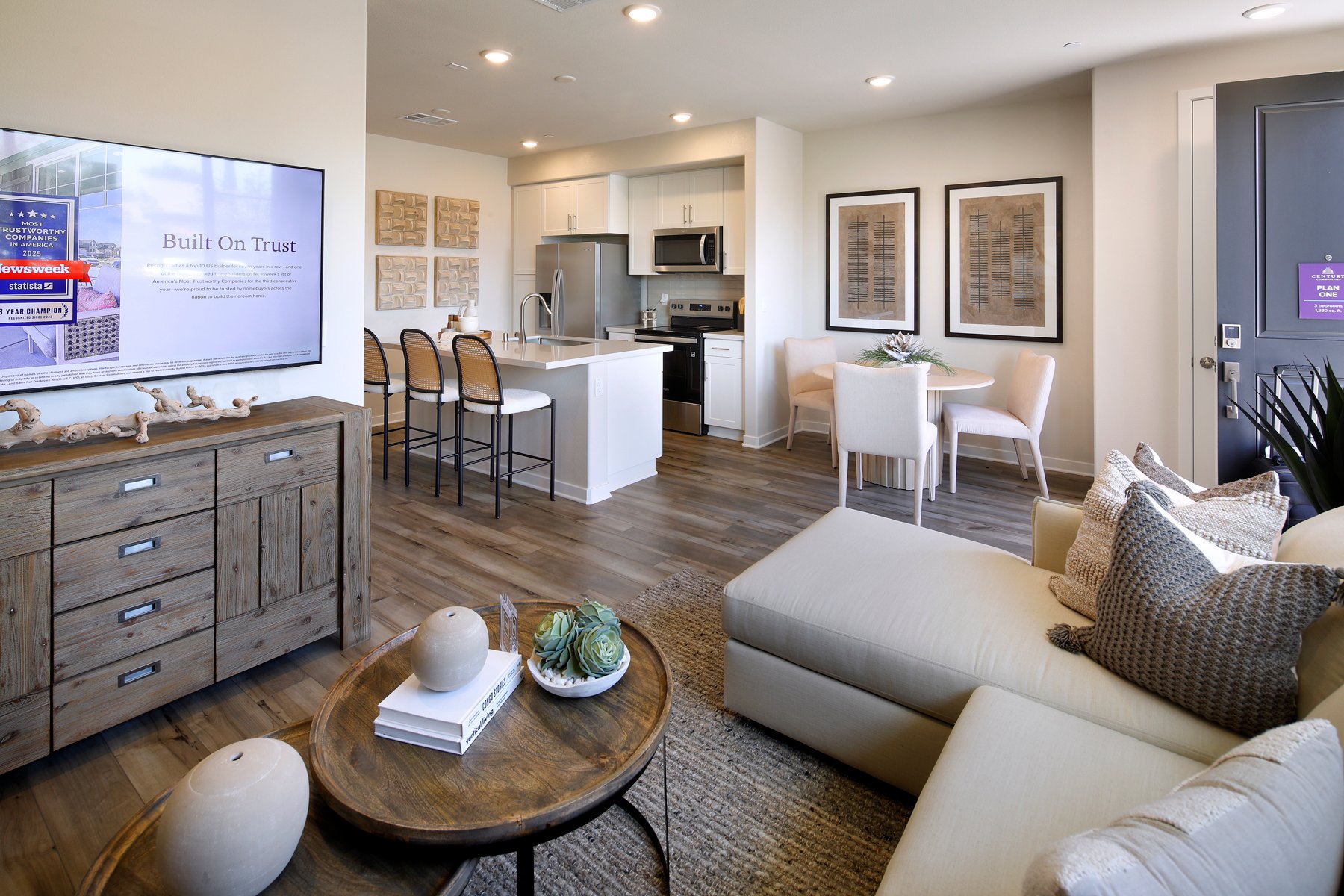 A living room with a large tv.