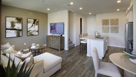 A living room with a tv and couches.