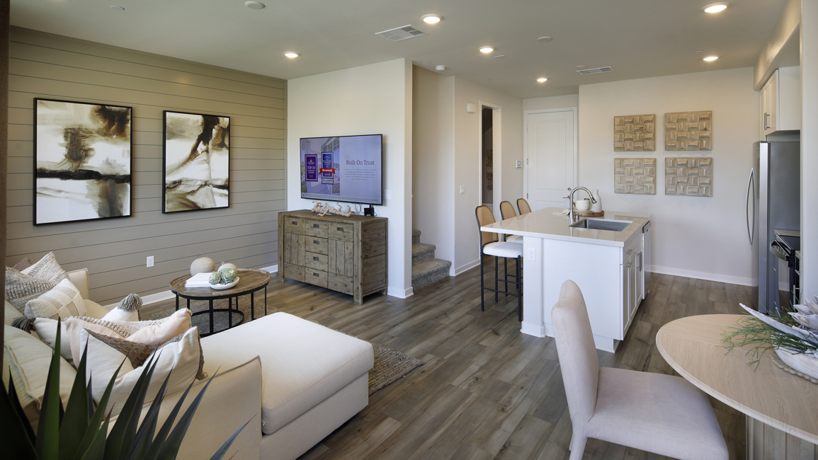 A living room with a tv and couches.