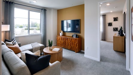 A living room with a large window.