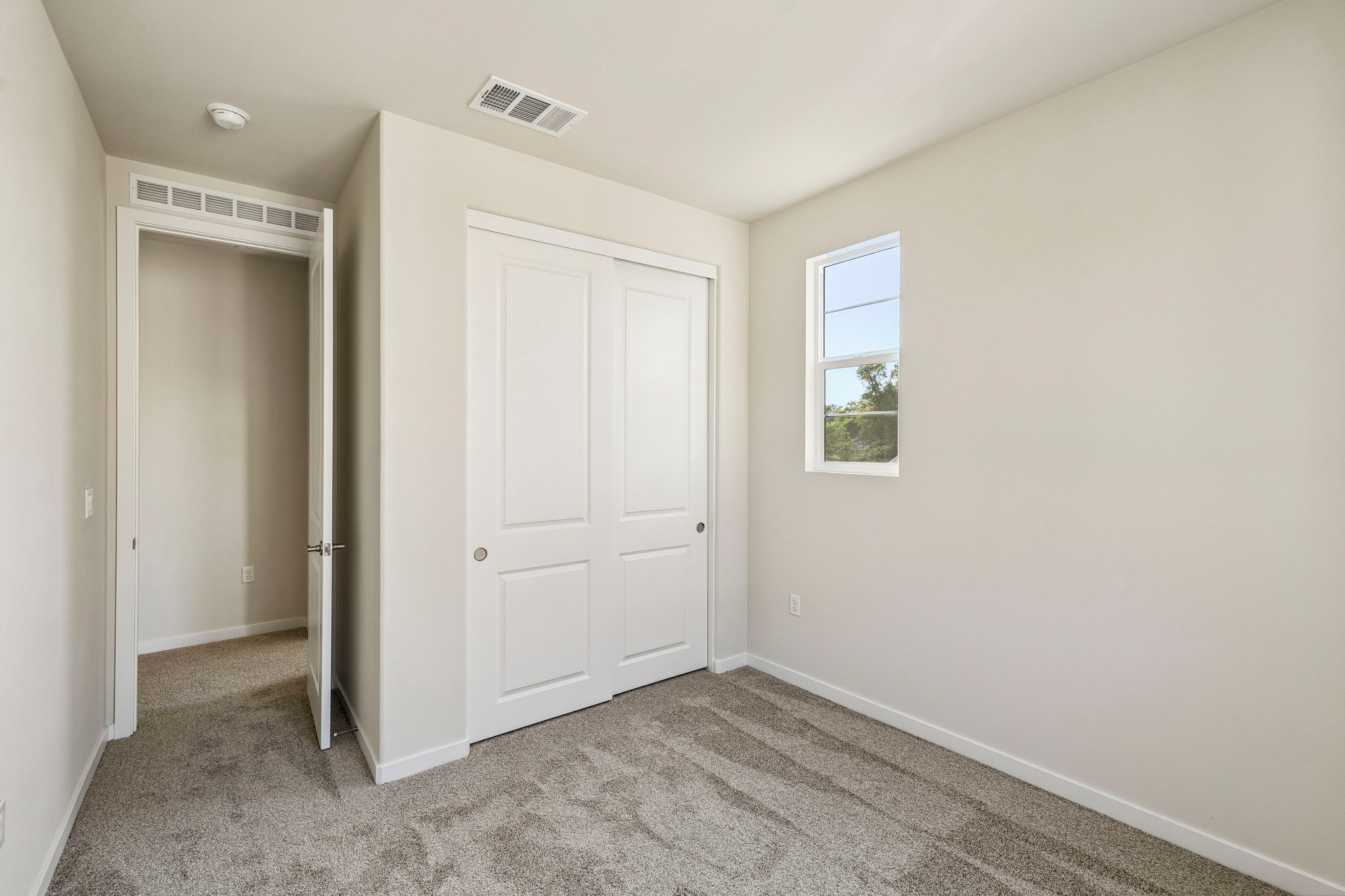 A room with white doors.