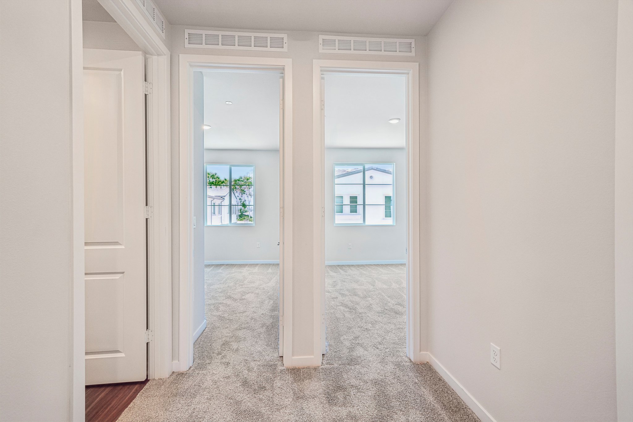 A room with white doors.