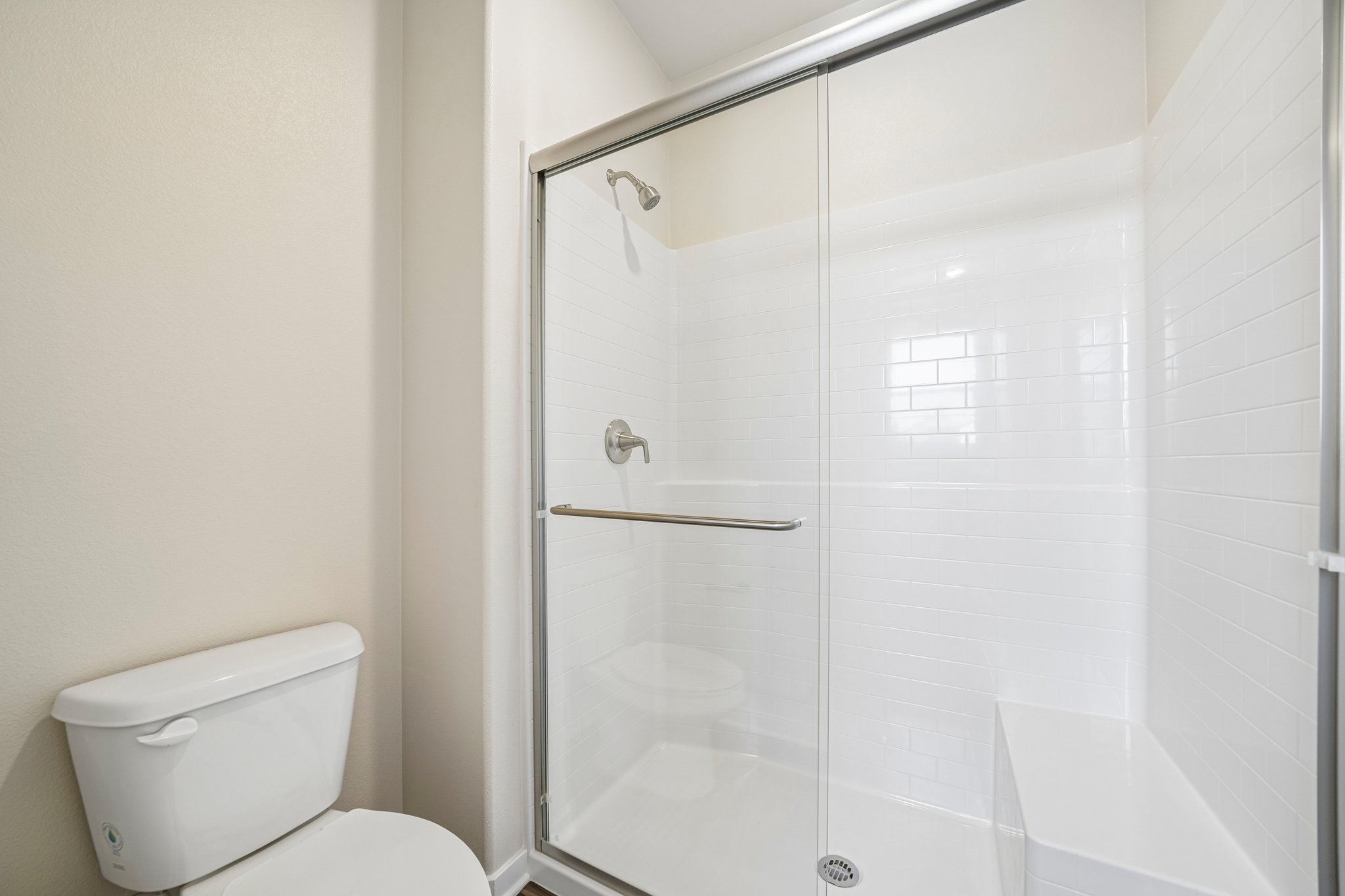 A shower unit in a bathroom.