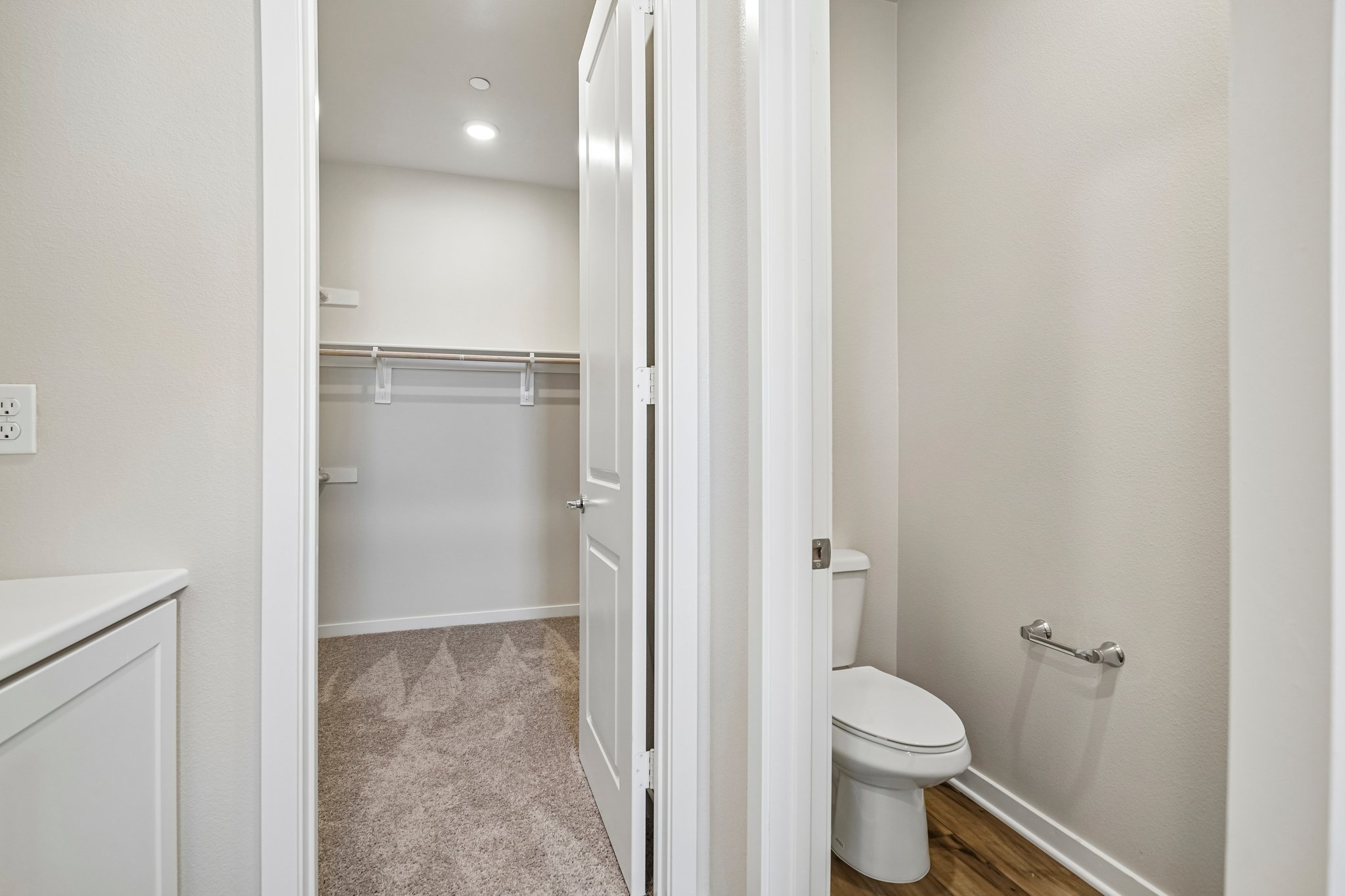 A bathroom with a shower unit.