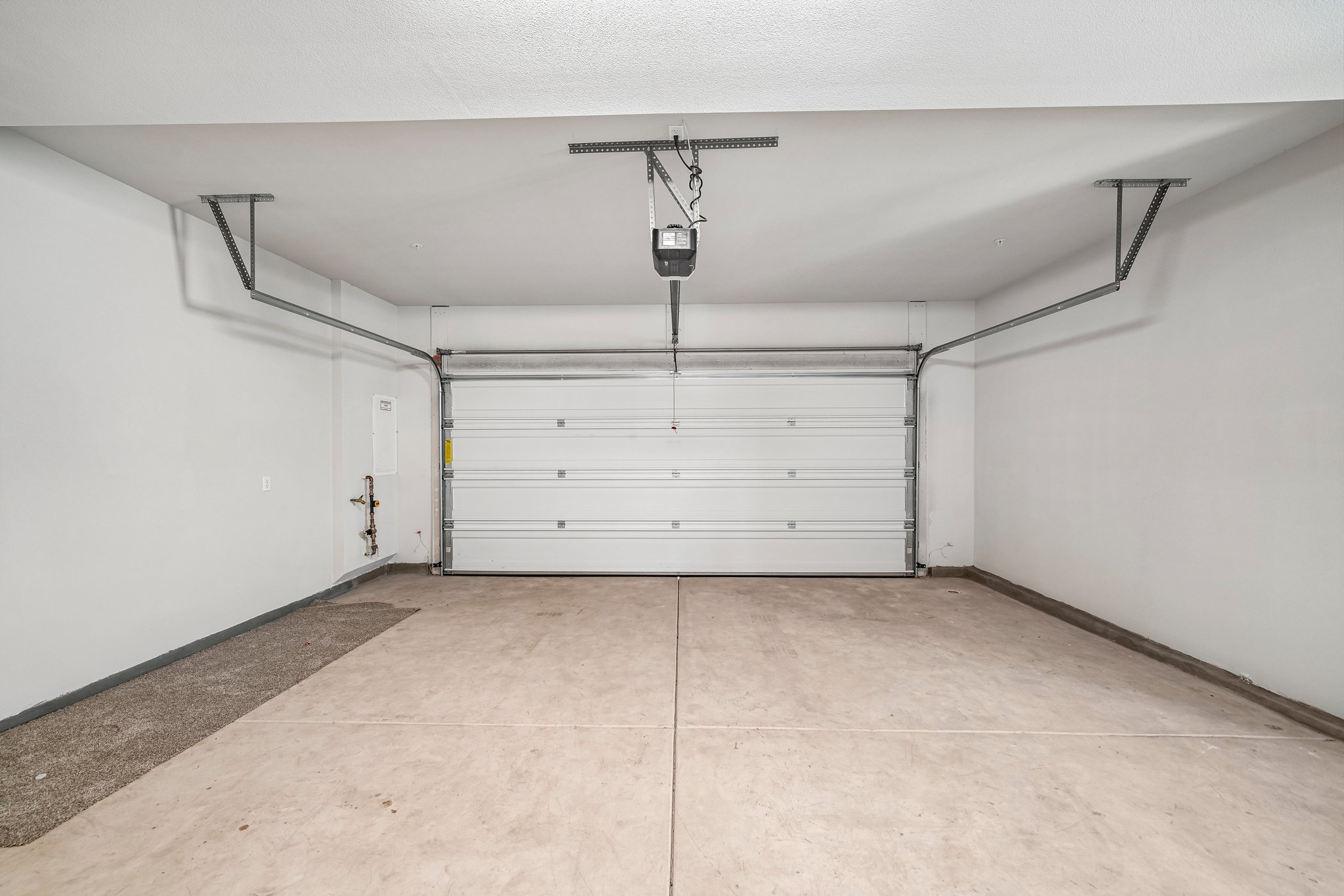 A room with white walls and a white floor.