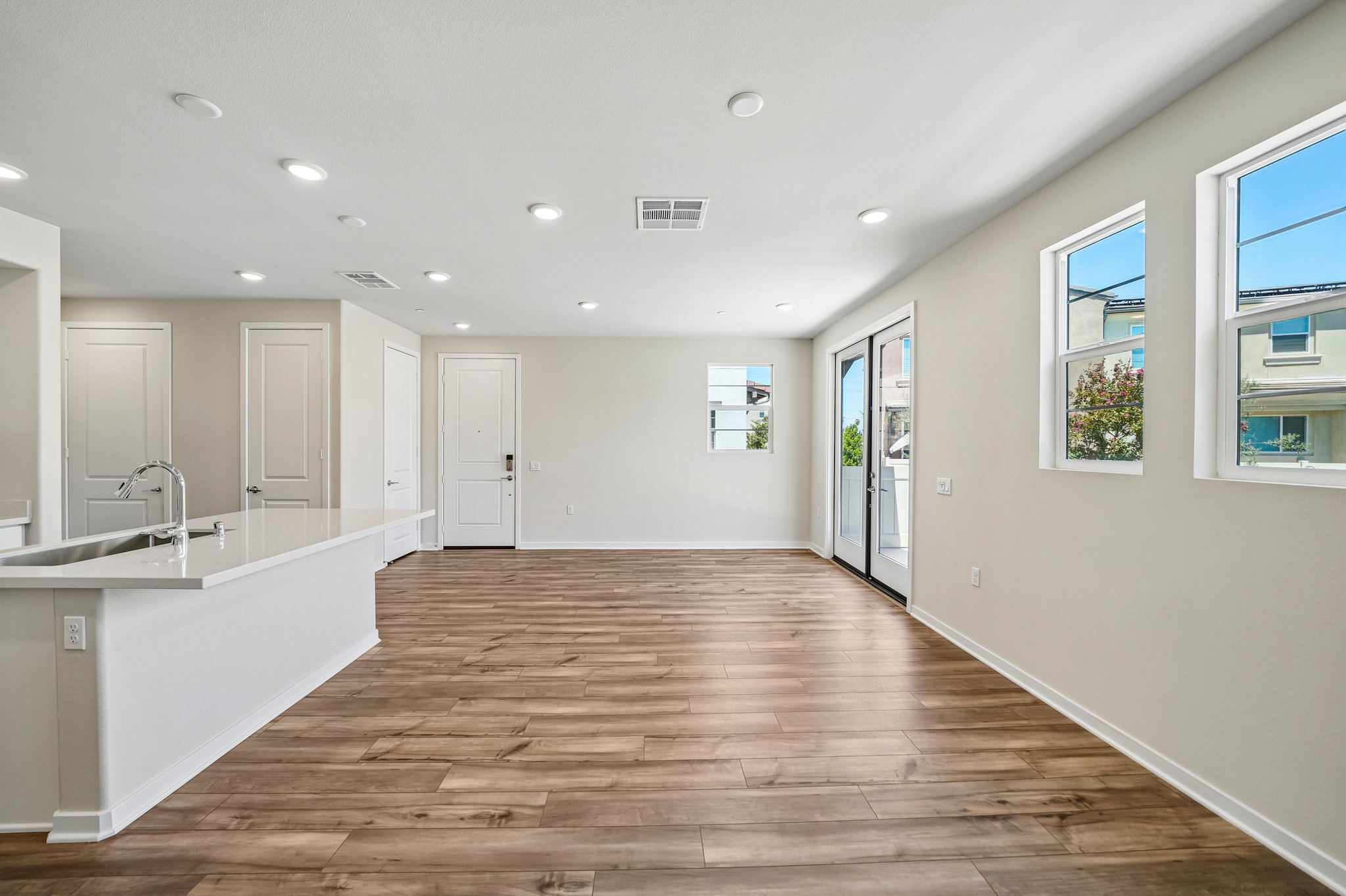 A large bathroom with white walls.