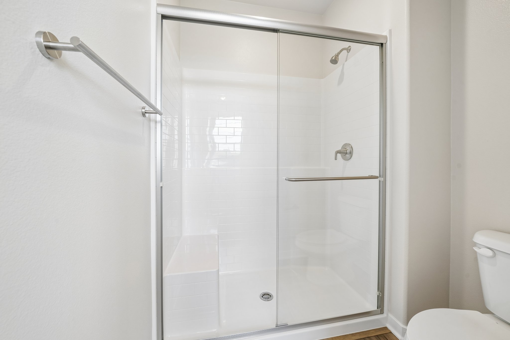 A shower unit in a bathroom.