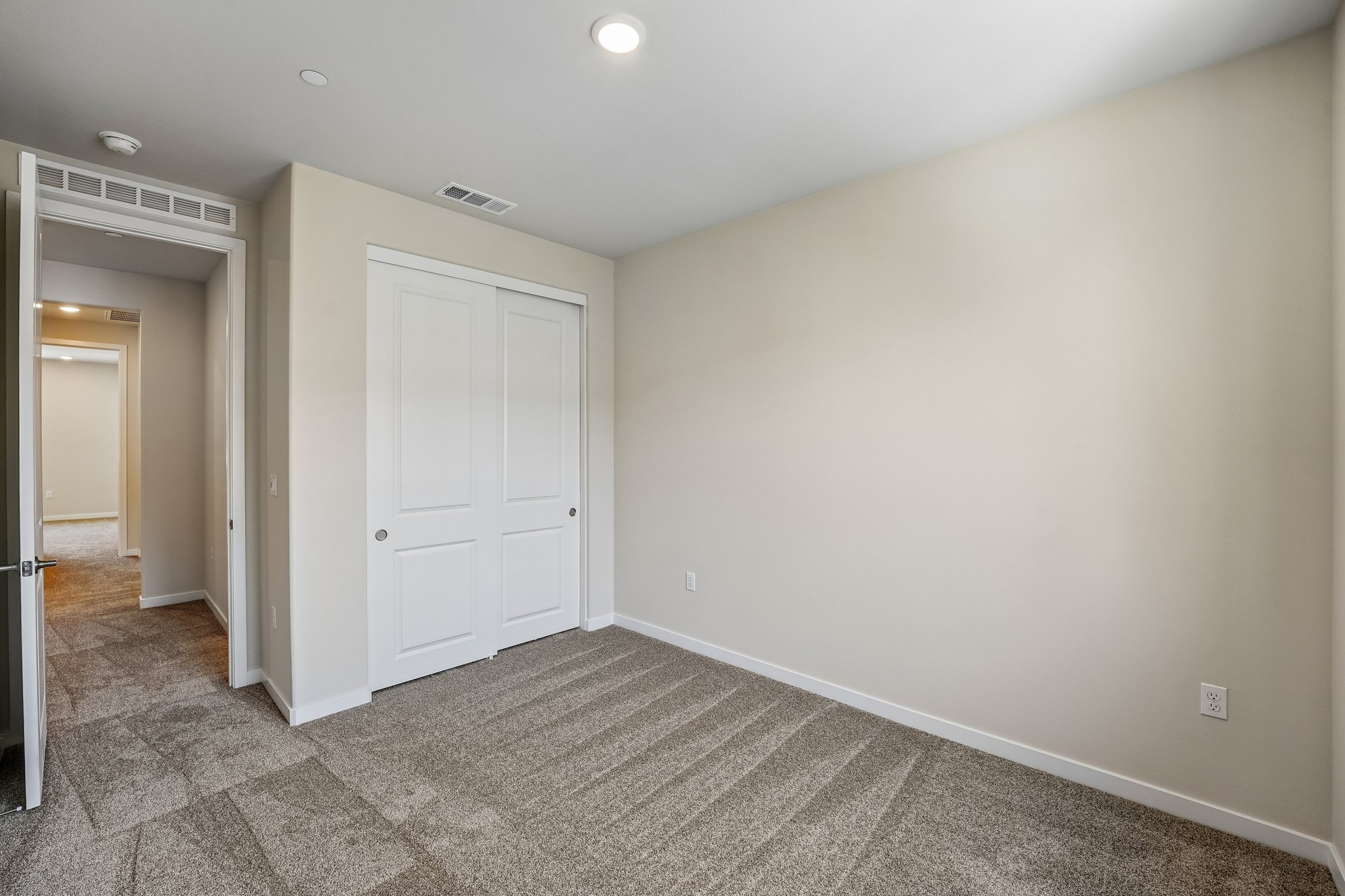 A room with white doors.