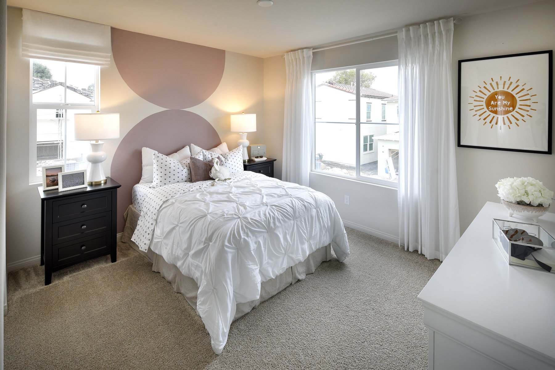 A bedroom with a large bed.