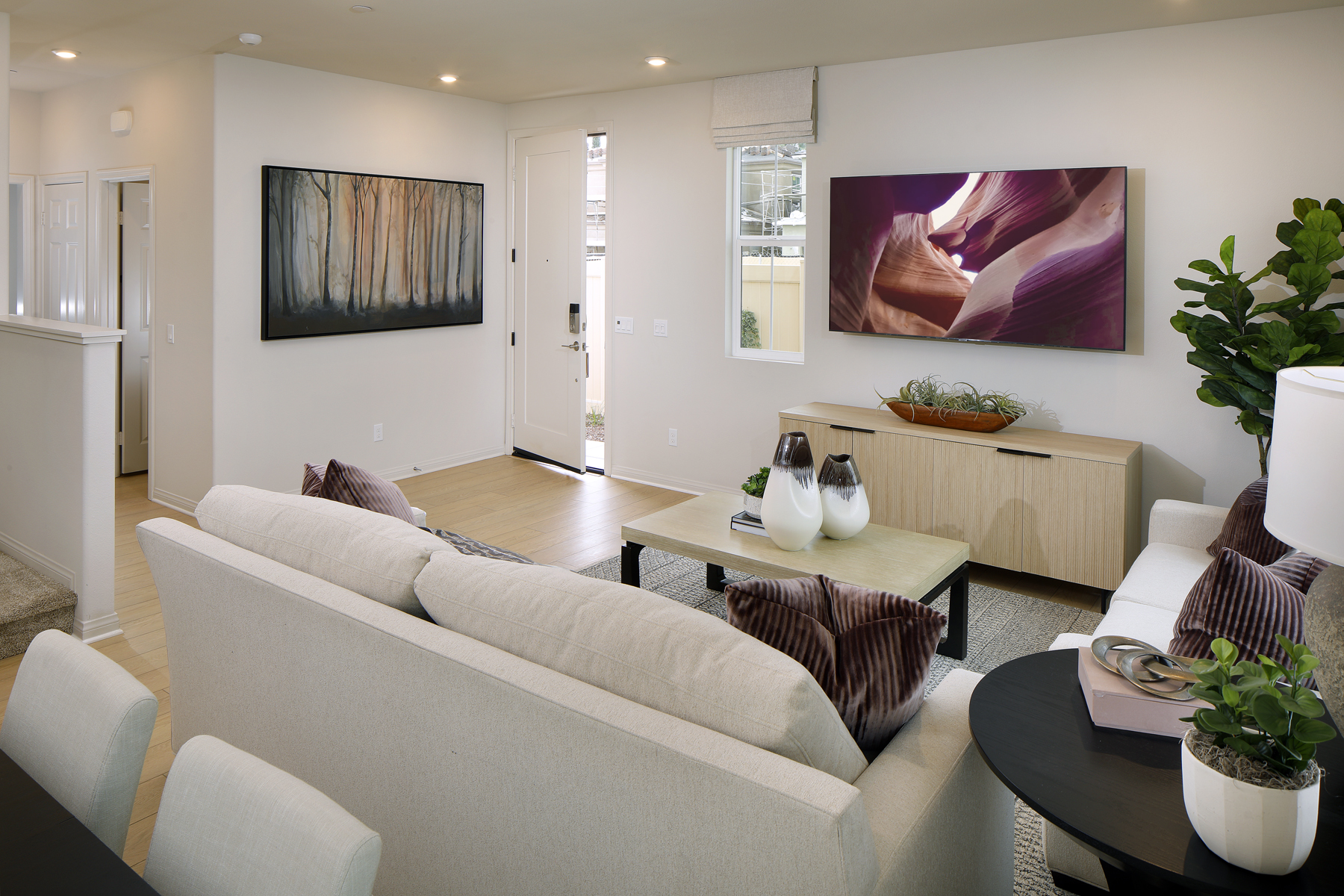 A living room with a couch and a coffee table.