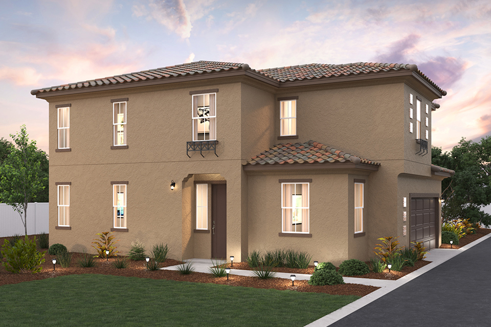 A large house with a lawn in front of it.