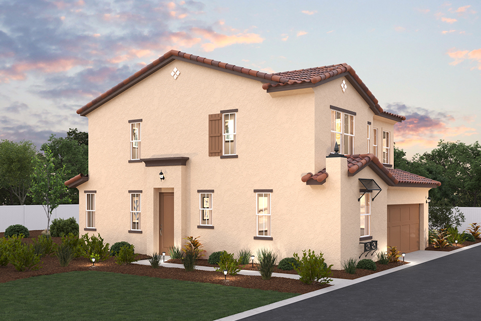 A large house with a lawn.