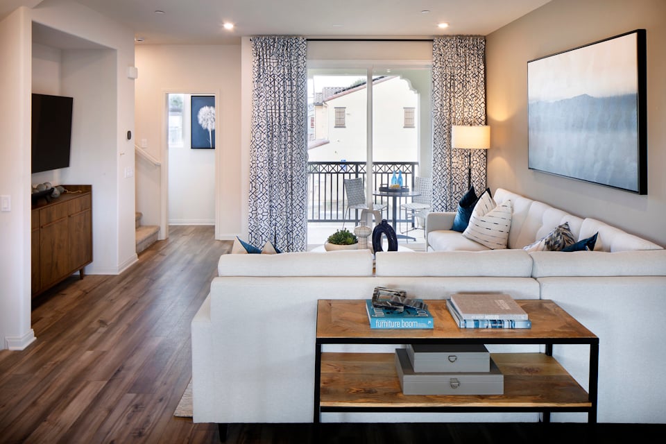 A living room with a large window.