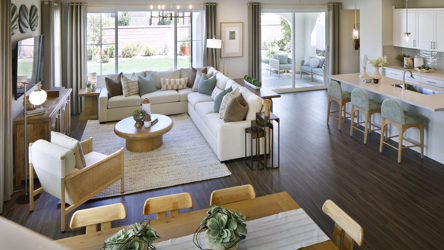 A living room with a large rug and a large dining table.