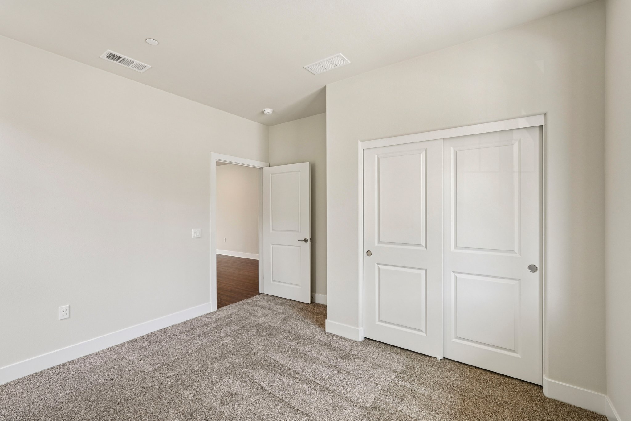 A room with white doors.