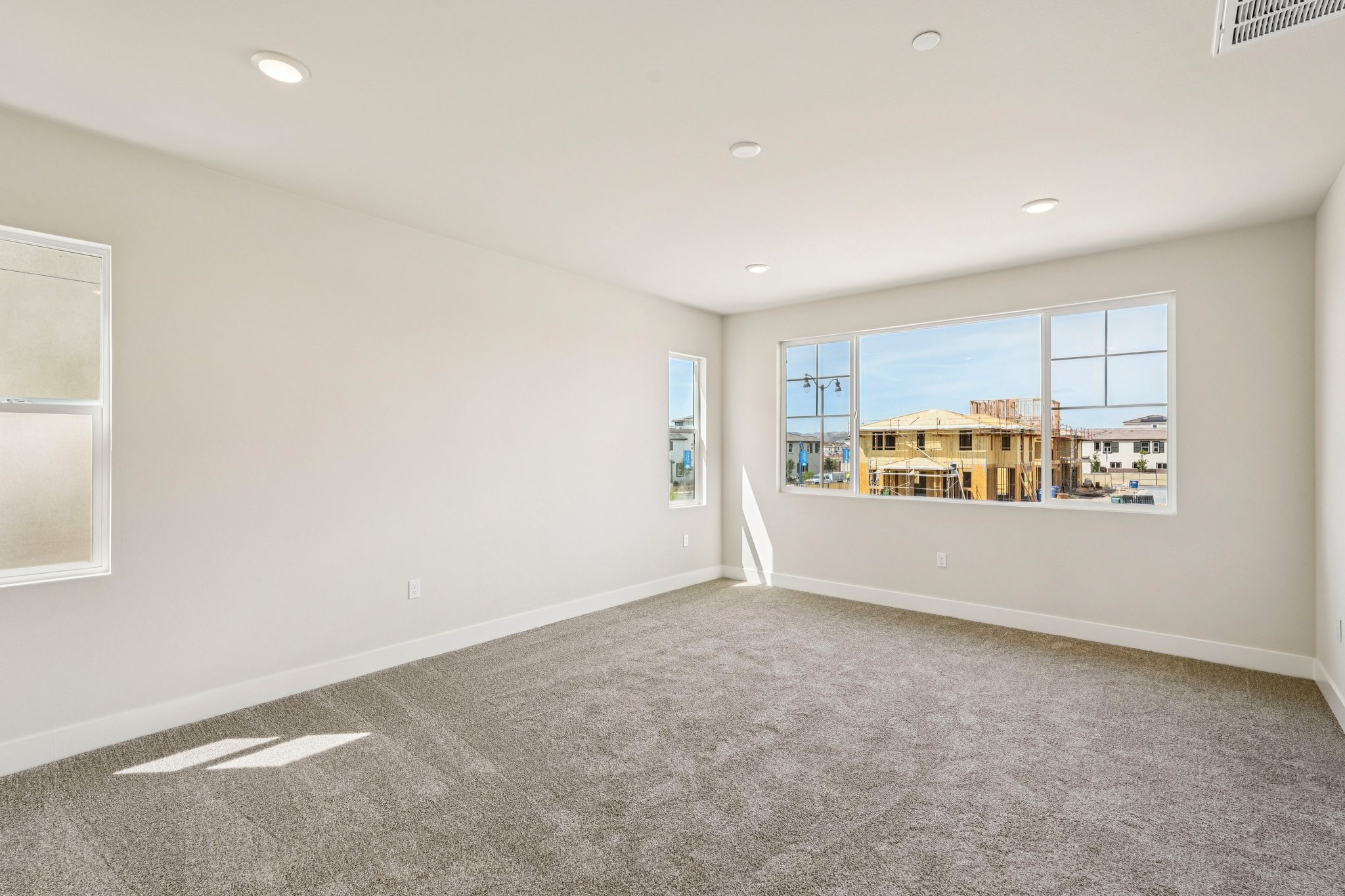 A room with a large window.