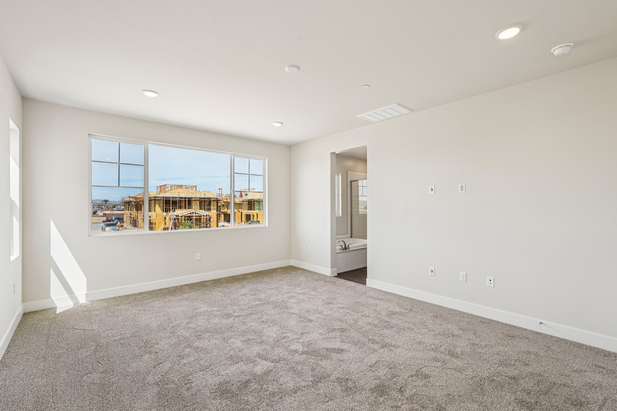 A room with a large window.
