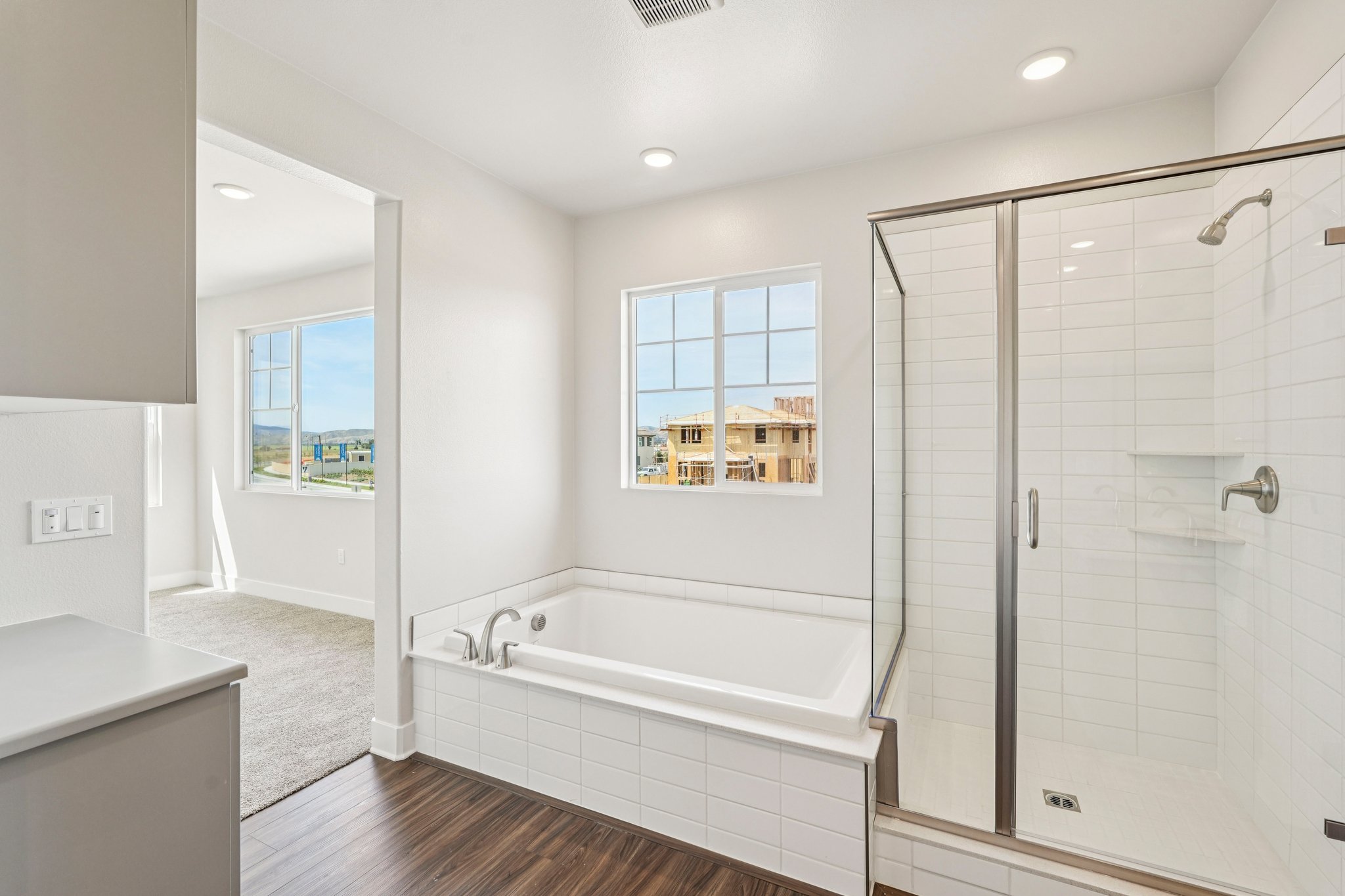 A bathroom with a glass shower.