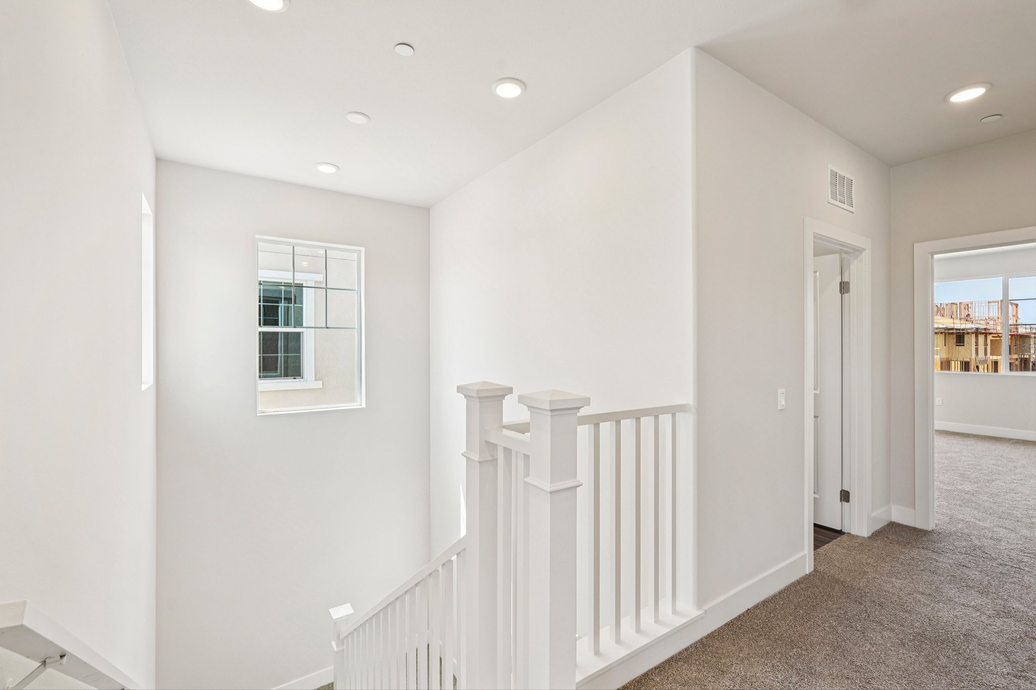A white staircase in a house.