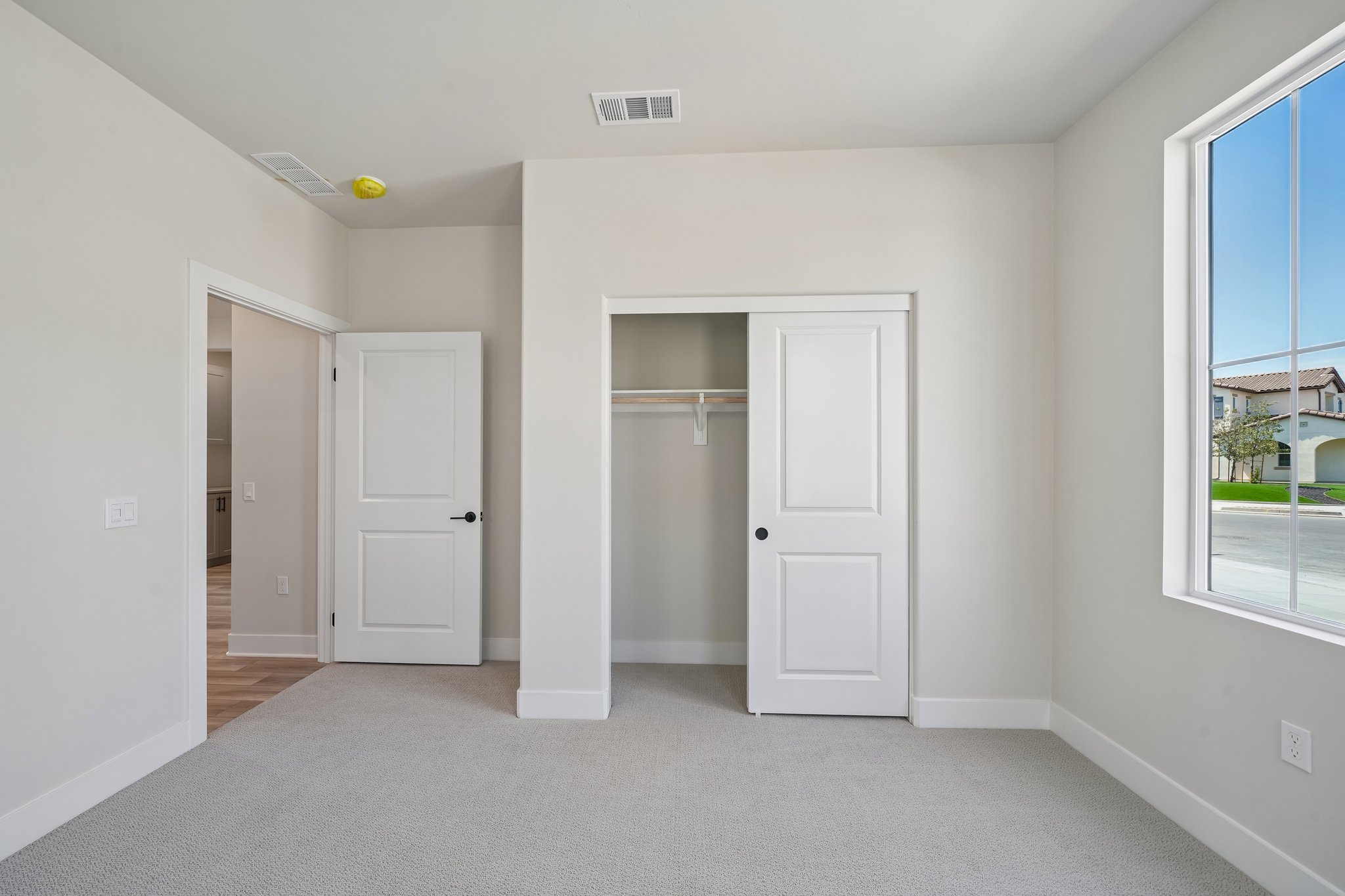 A room with white doors.