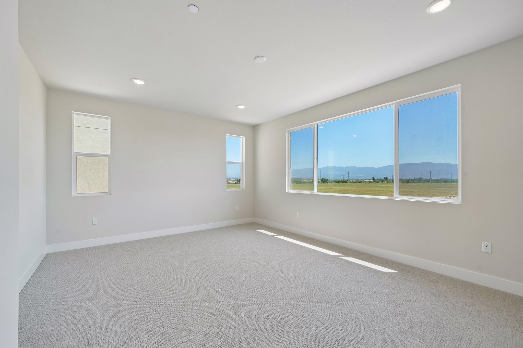 A room with a large window.