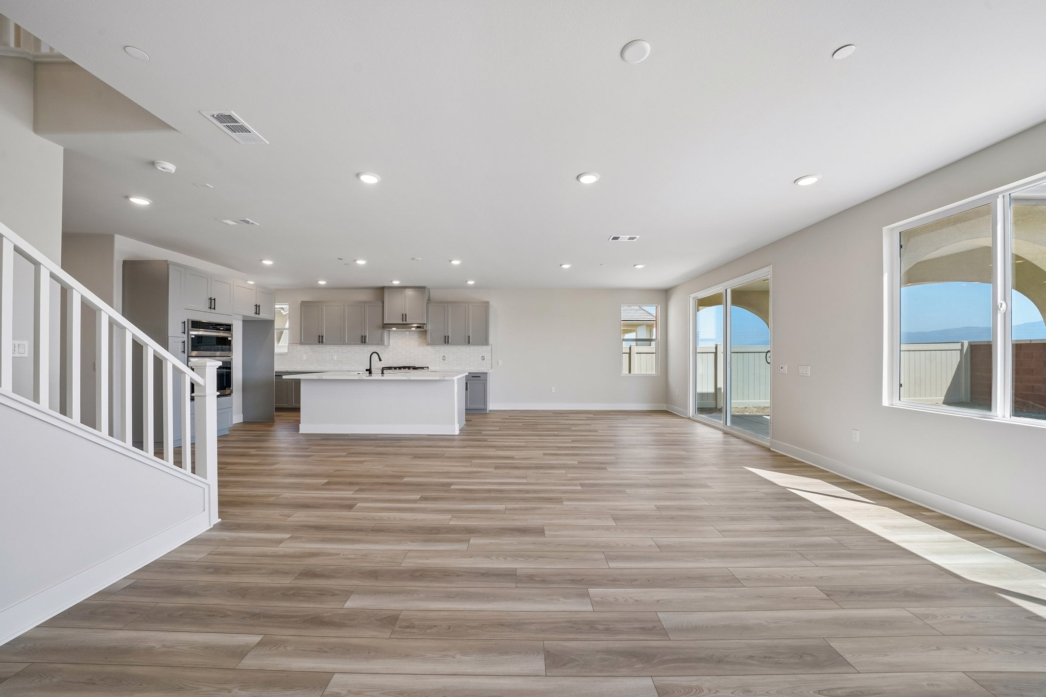 A large empty room with white walls.