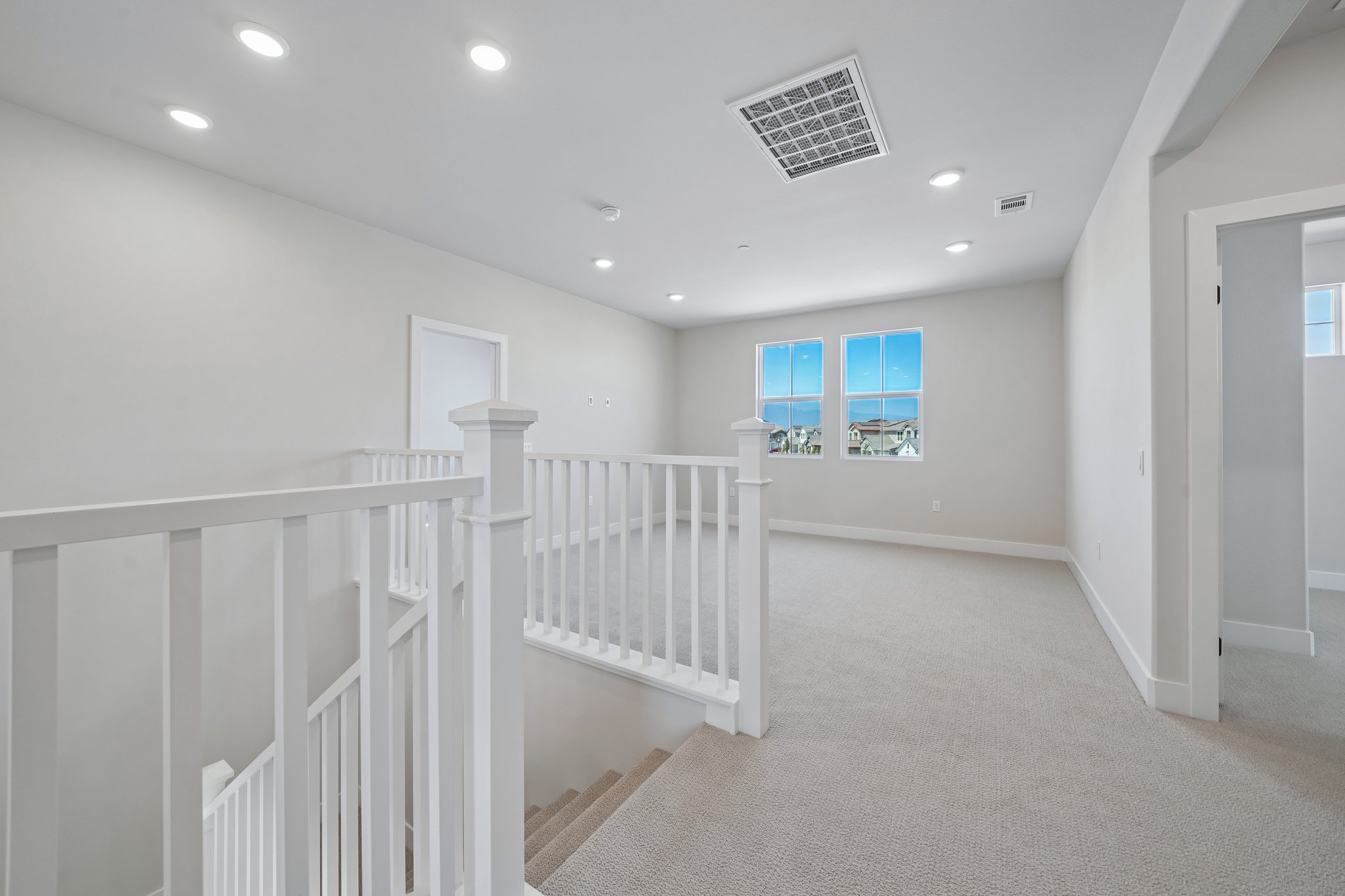 A white staircase in a house.