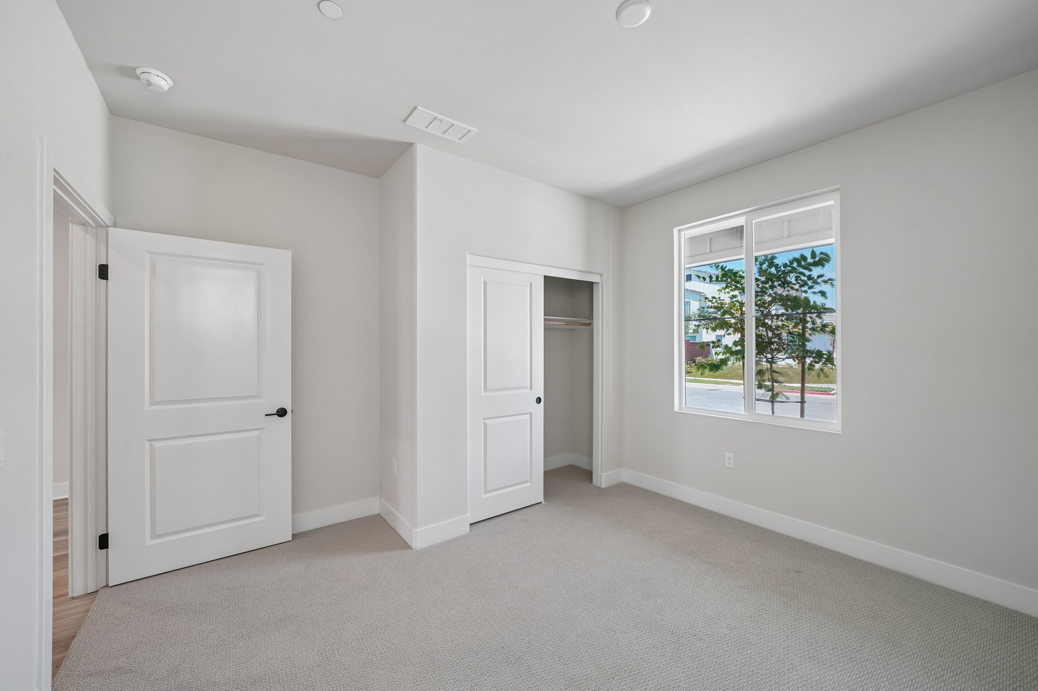 A room with white doors.