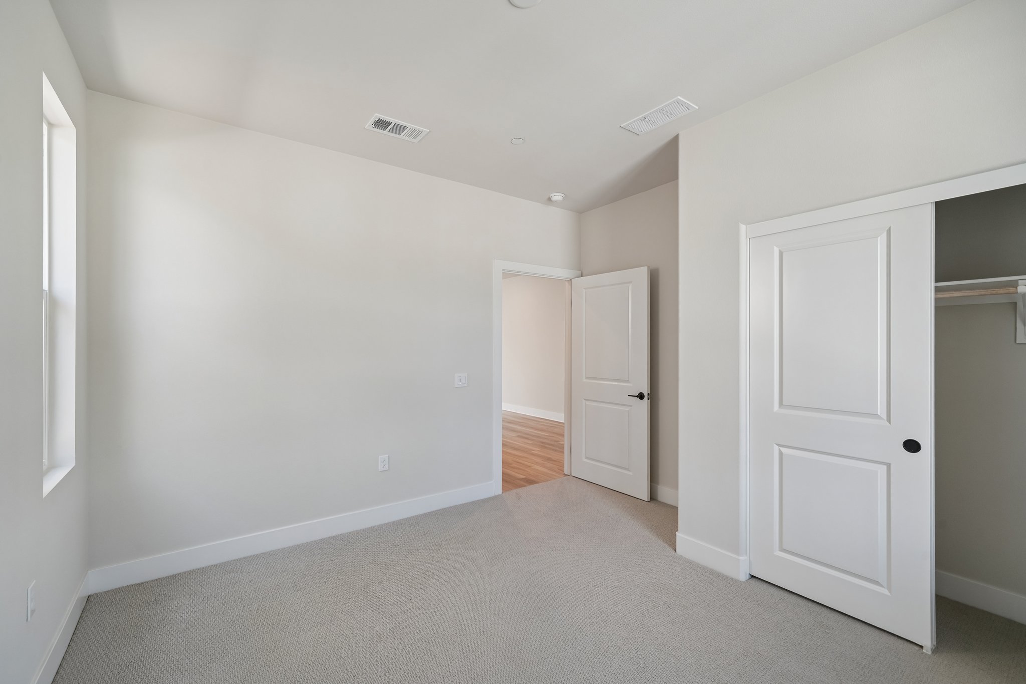 A room with white doors.
