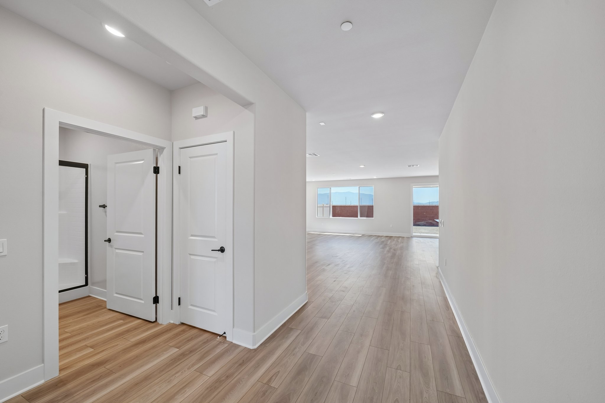 A room with white cabinets.