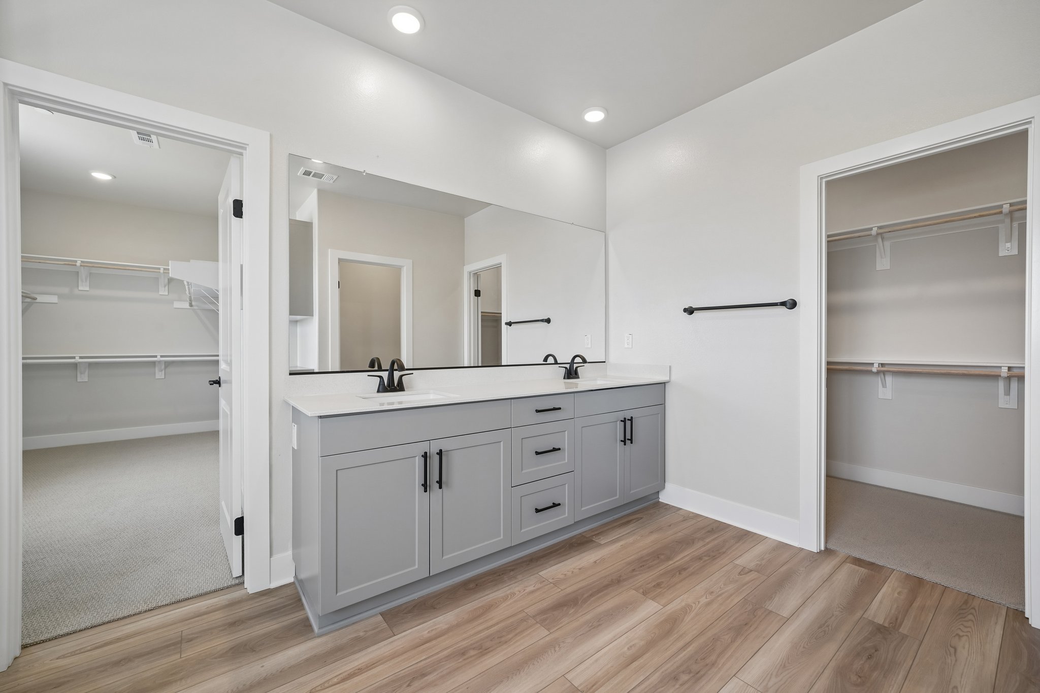 A bathroom with a glass shower.